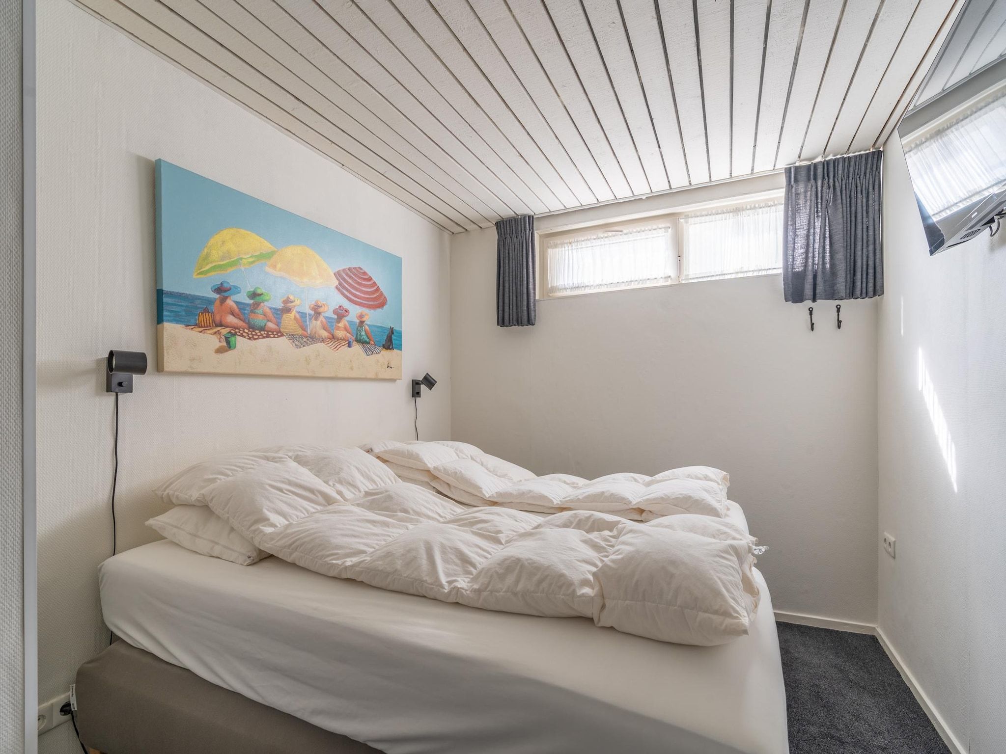 Een slaapkamer van De Anna 220 - Zand in De Koog