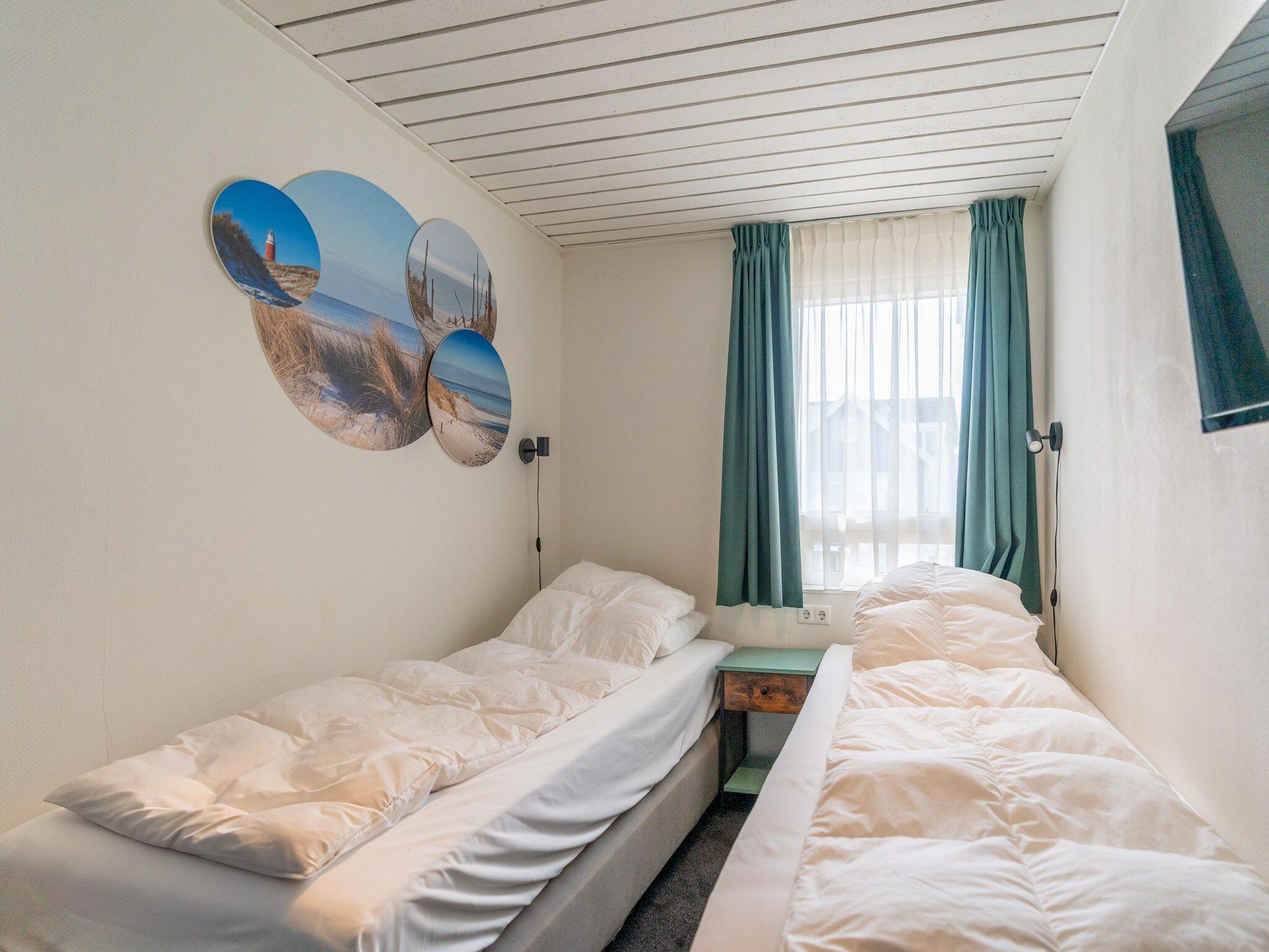 Een slaapkamer van De Anna 220 - Zand in De Koog
