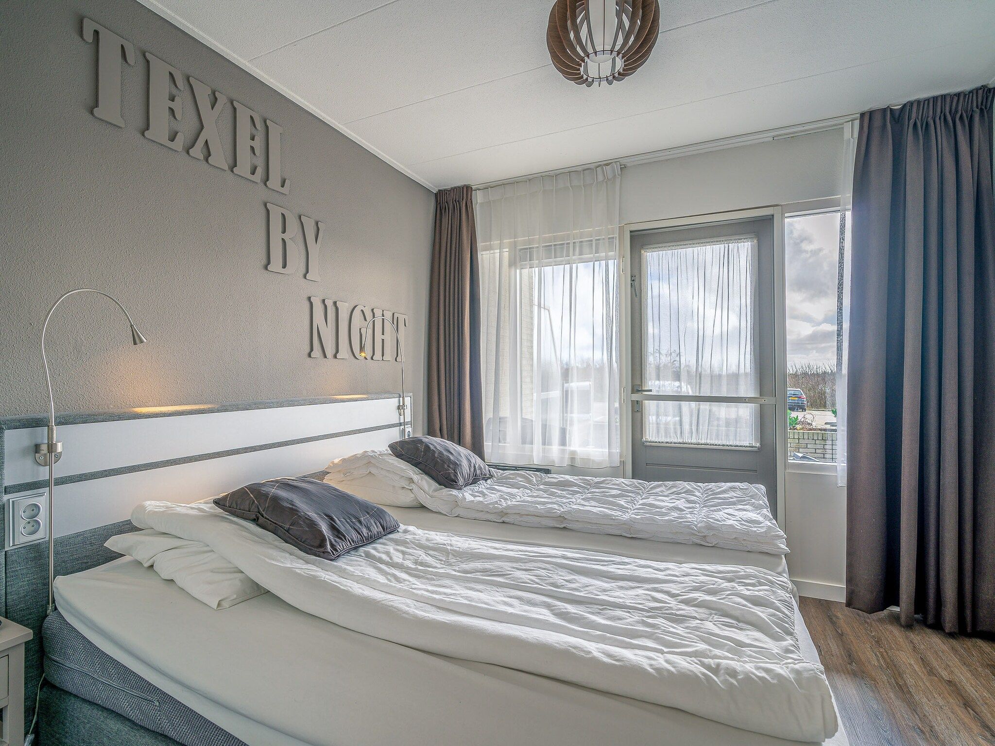 Een slaapkamer van Juliana 072 in De Koog