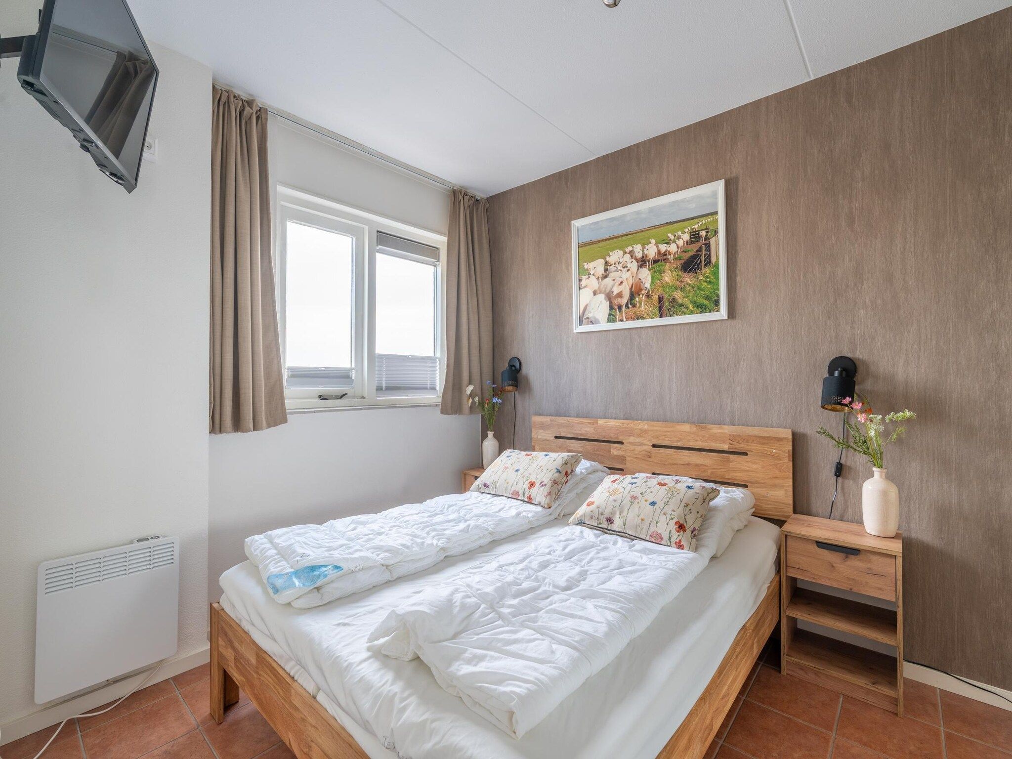 Een slaapkamer van Juliana 142 in De Koog