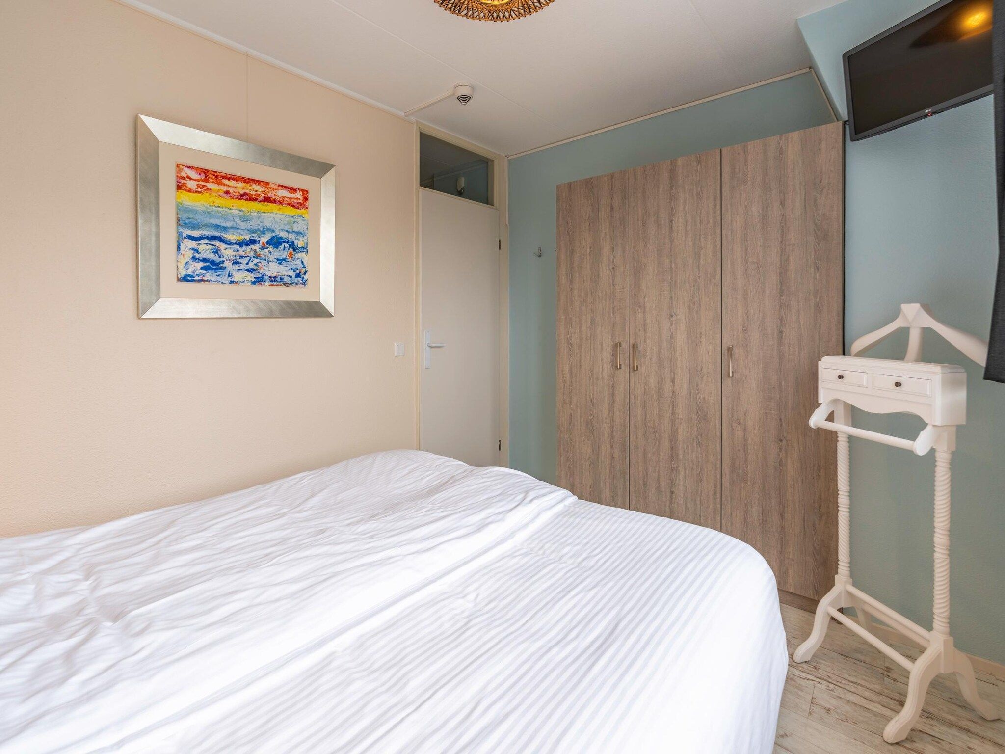 Een slaapkamer van Juliana 148 in De Koog