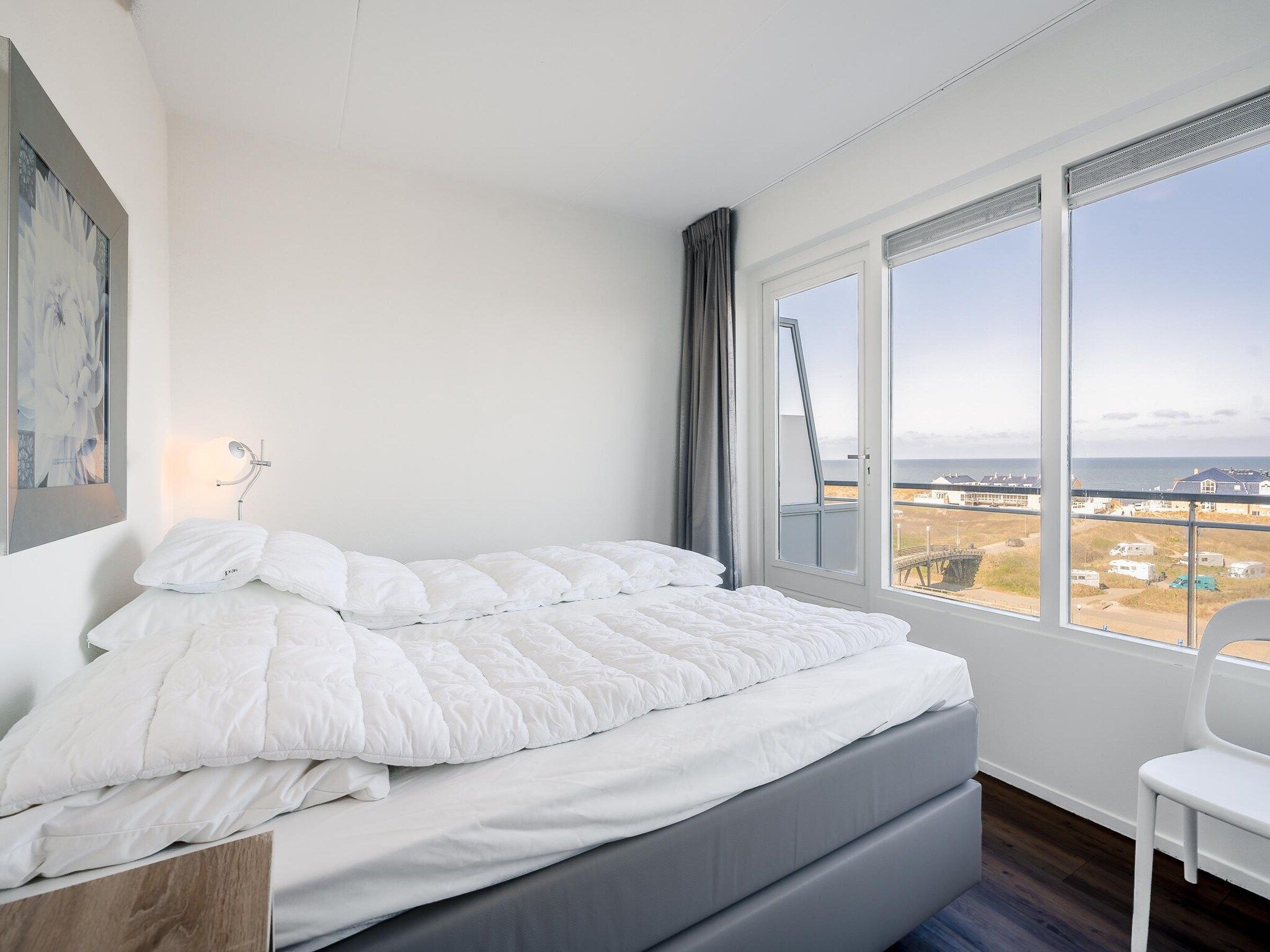 Een slaapkamer van Juliana 154 in De Koog