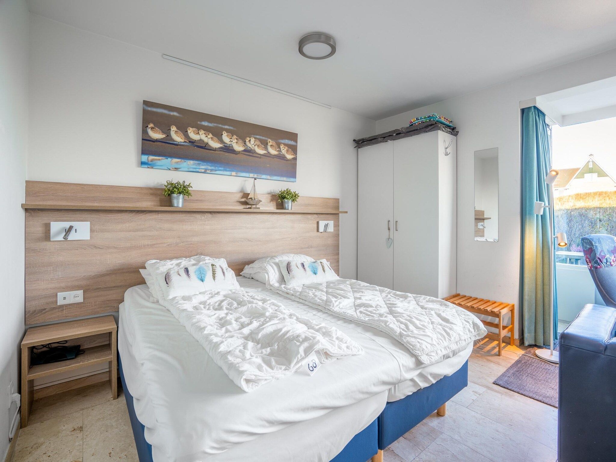 Een slaapkamer van Juliana 068 in De Koog