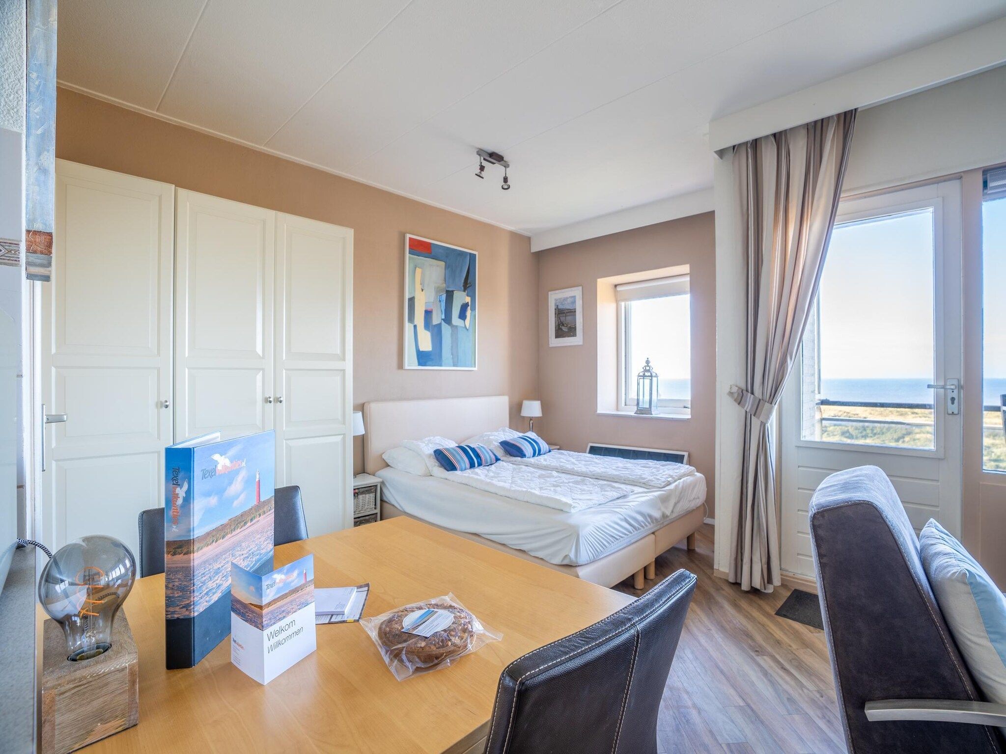Een slaapkamer van Juliana 158 in De Koog