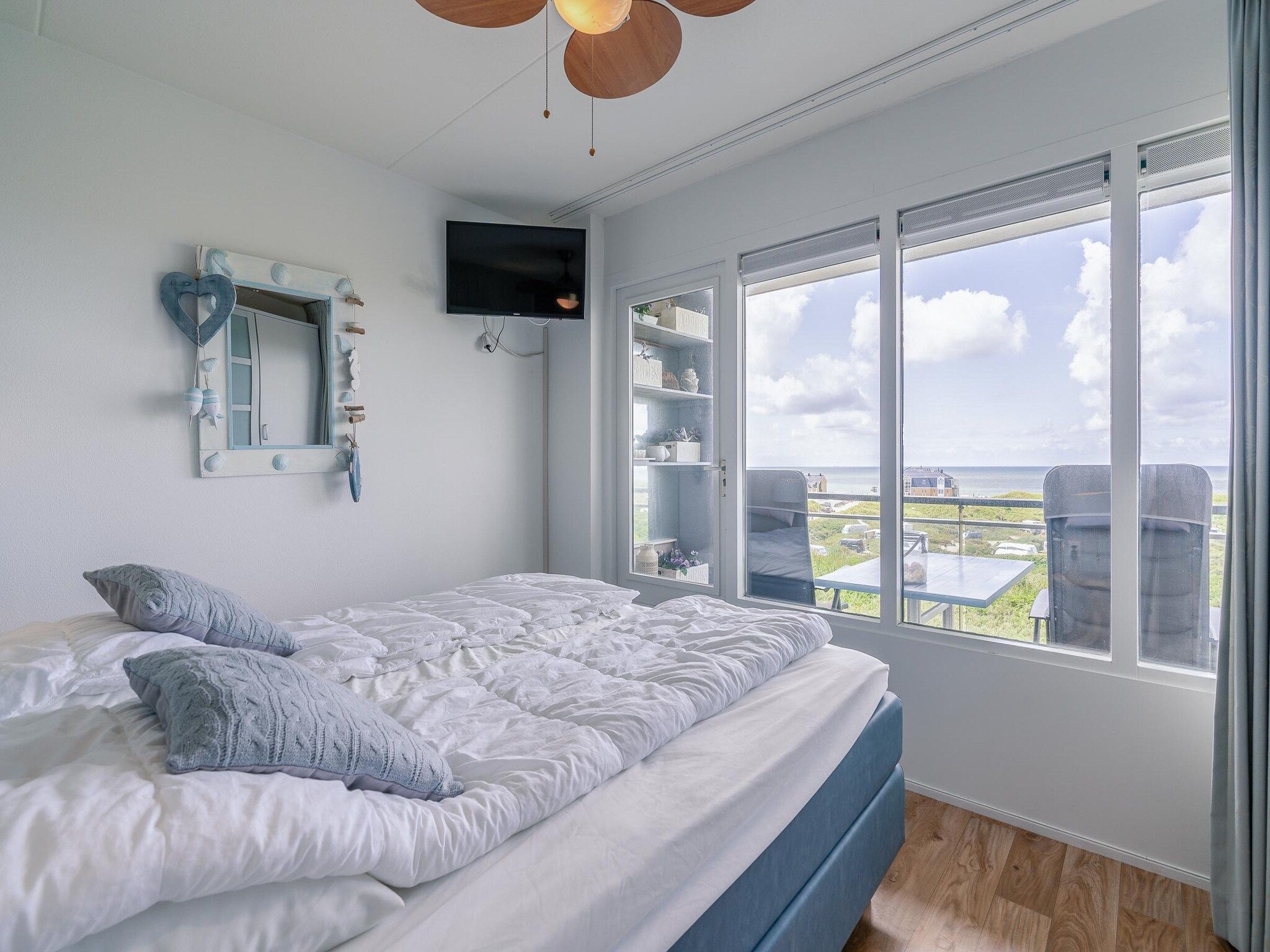 Een slaapkamer van Juliana 106 in De Koog