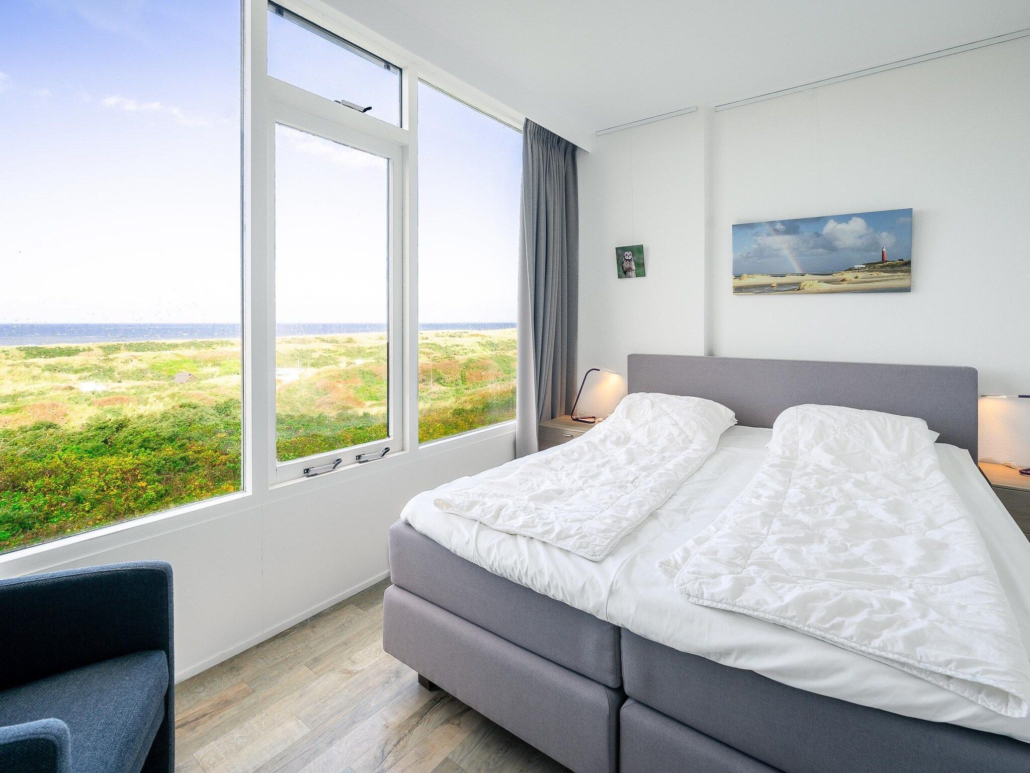 Een slaapkamer van Juliana 112 in De Koog