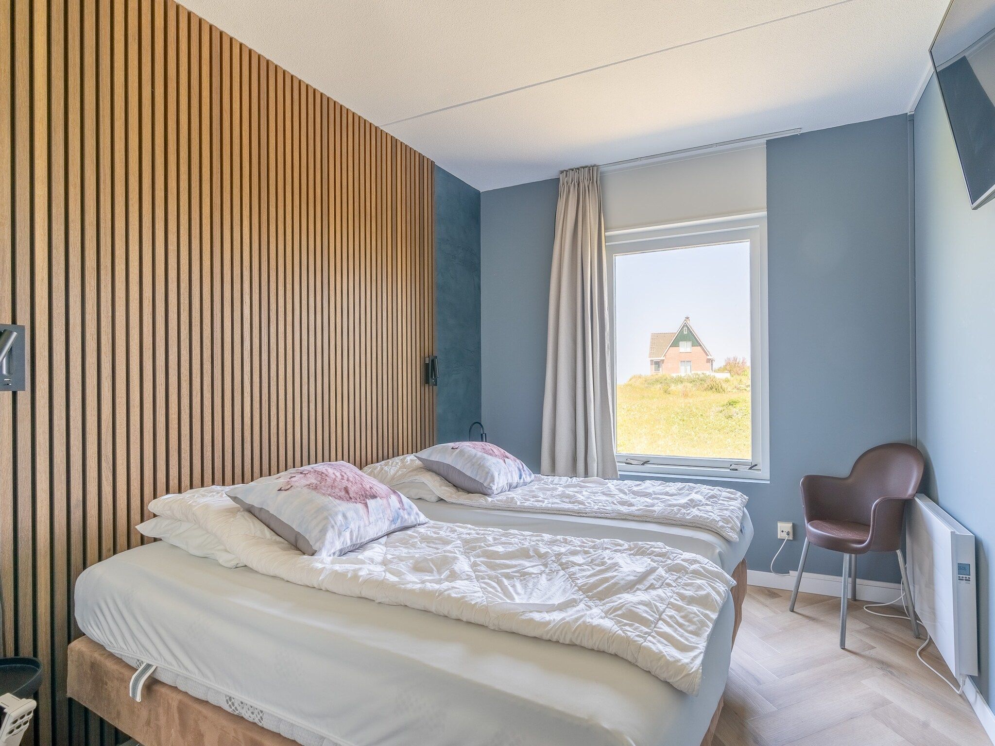 Een slaapkamer van Juliana 120 in De Koog