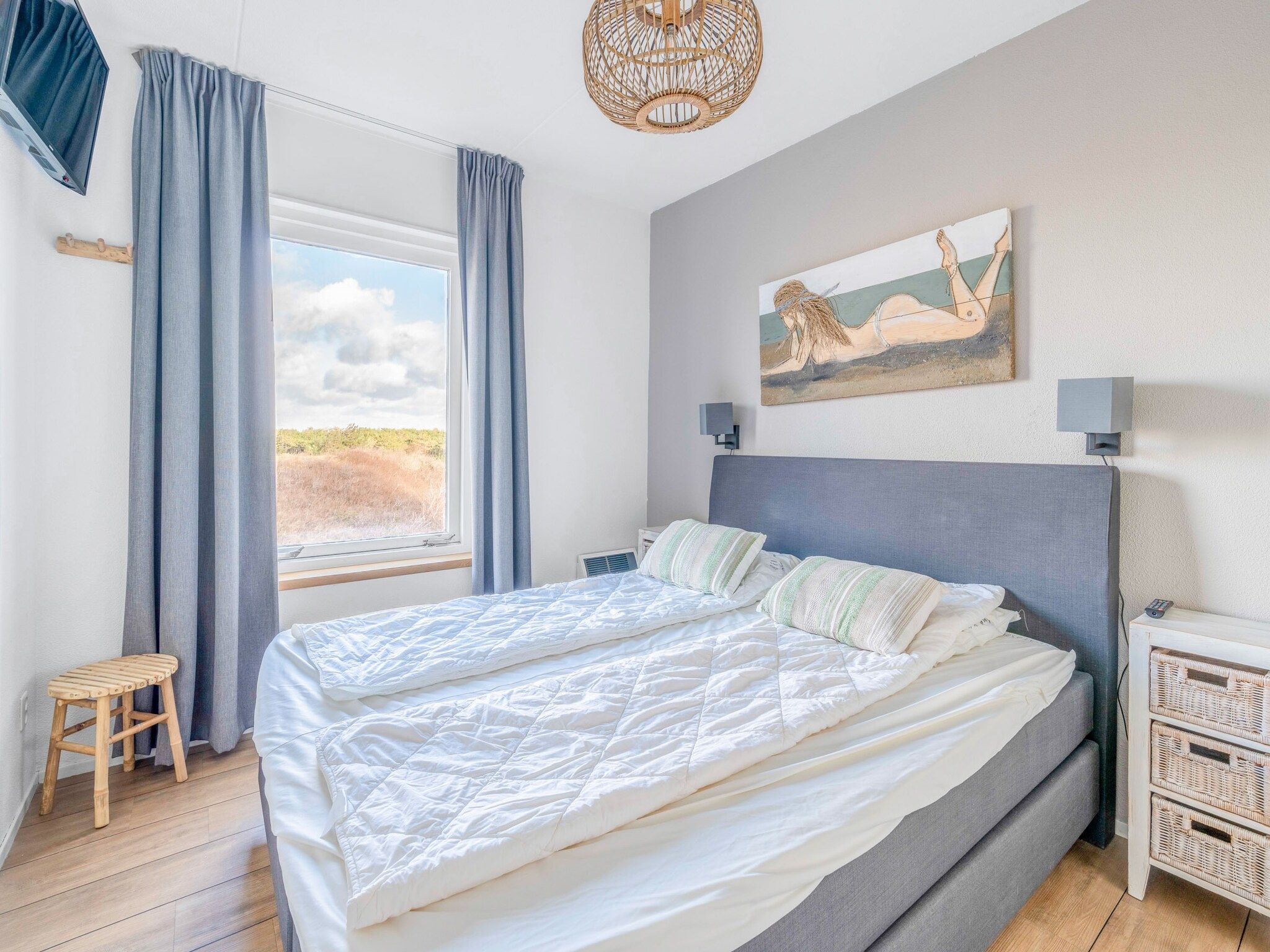 Een slaapkamer van Juliana 118 in De Koog