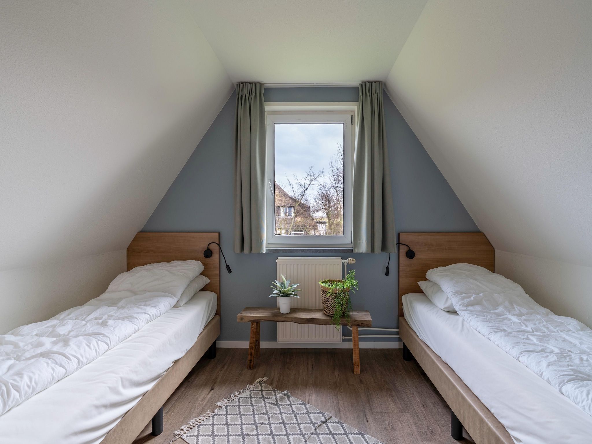 Een slaapkamer van Nieuwlanderweg 77 in De Waal