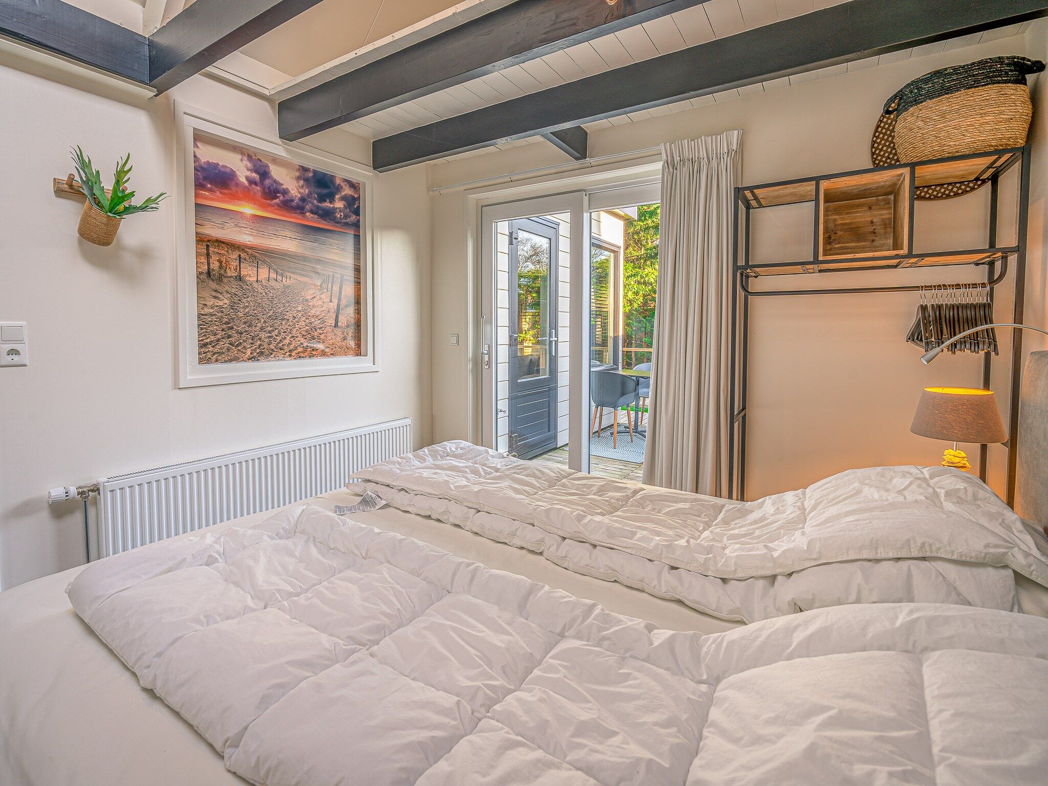 Een slaapkamer van Zee van Tijd in De Koog