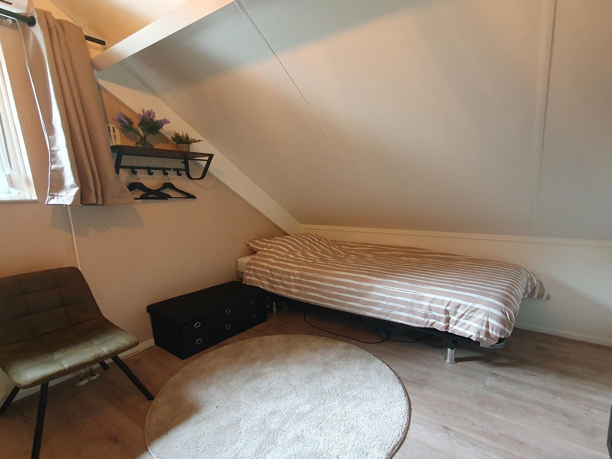 Een slaapkamer van 7 - Persoons Forest 217 Sauna Bungalow in Ewijk