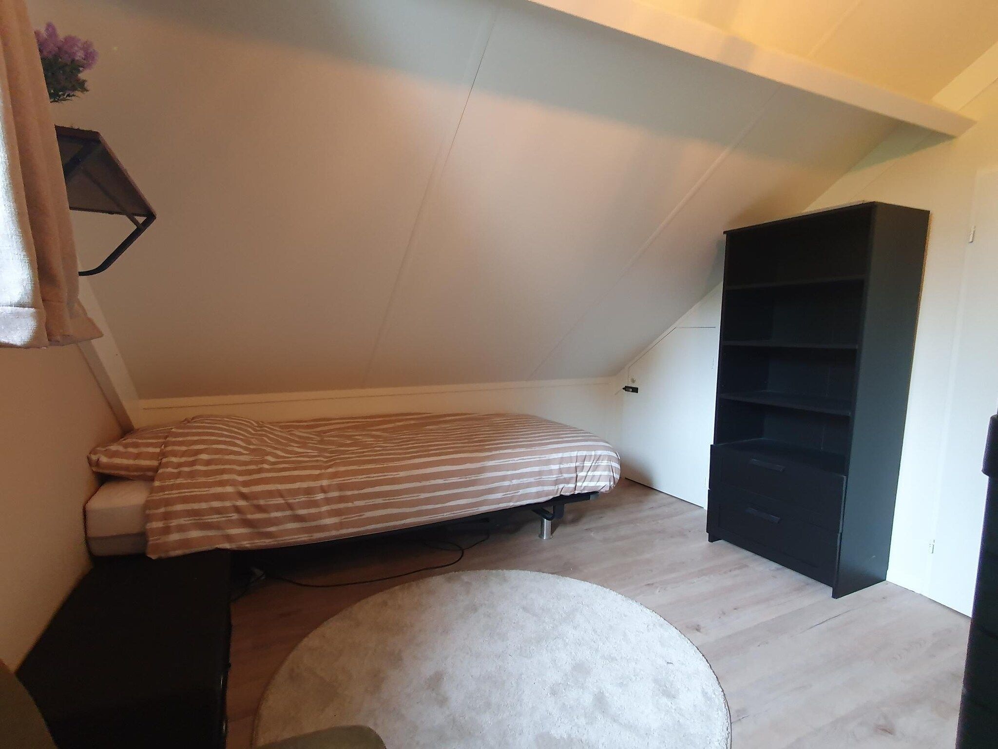 Een slaapkamer van 7 - Persoons Forest 217 Sauna Bungalow in Ewijk