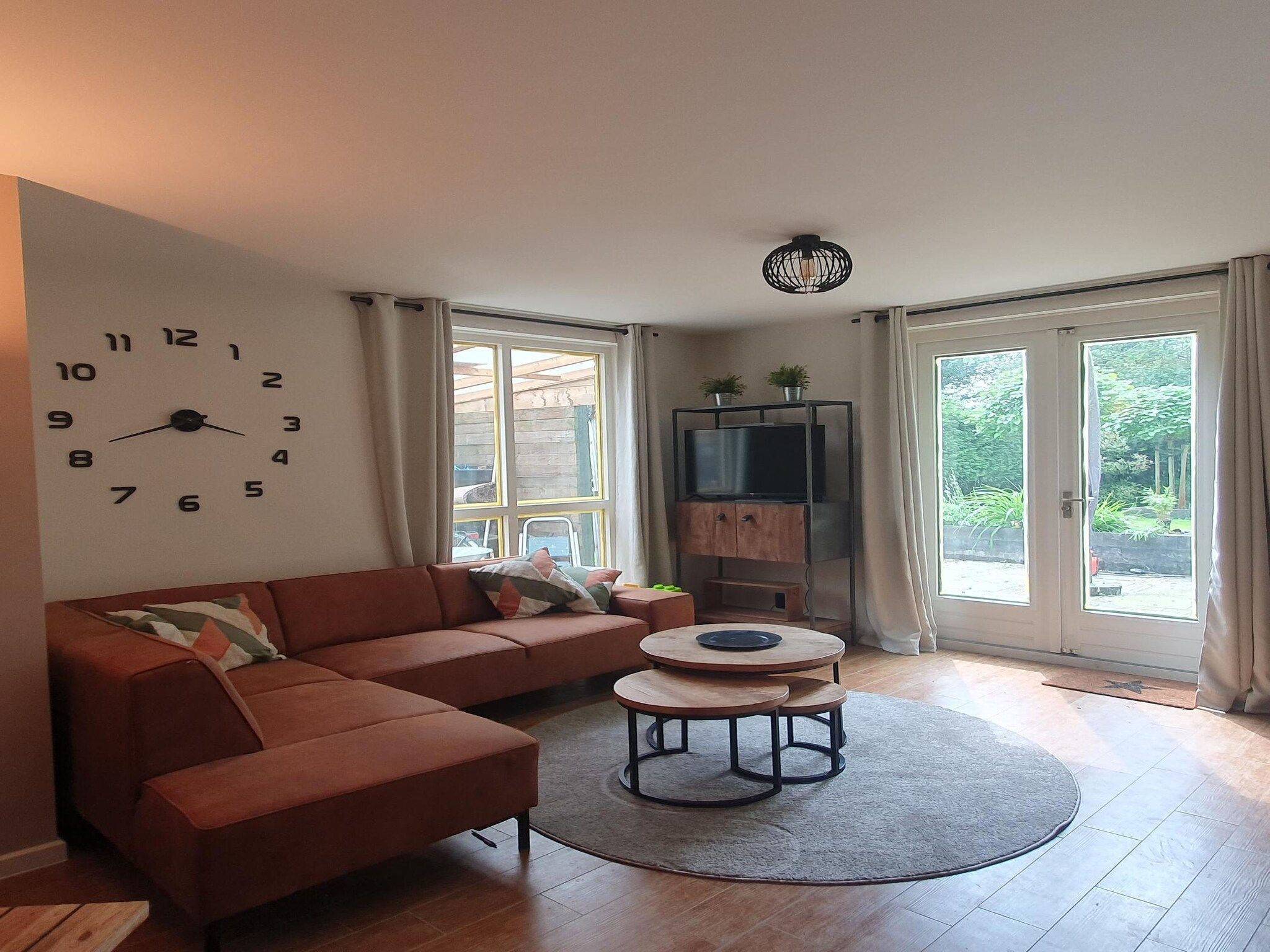 De woonkamer van 7 - Persoons Forest 217 Sauna Bungalow in Ewijk