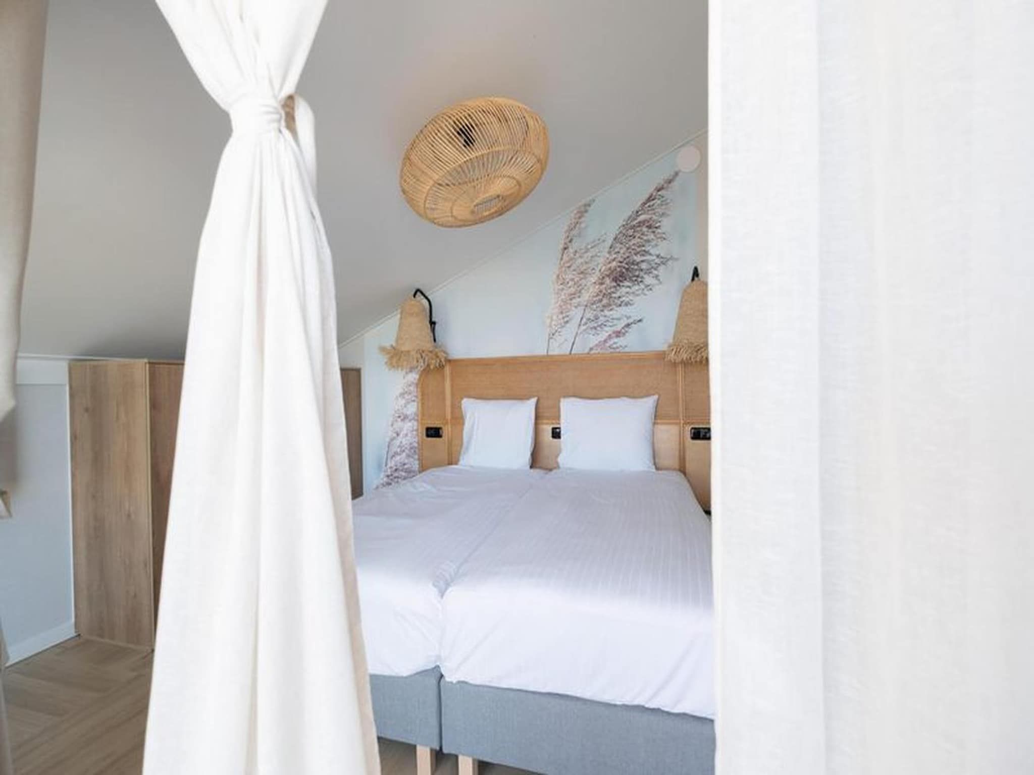 Een slaapkamer van Luxury Beach Apartment | 6 Pers. in Workum