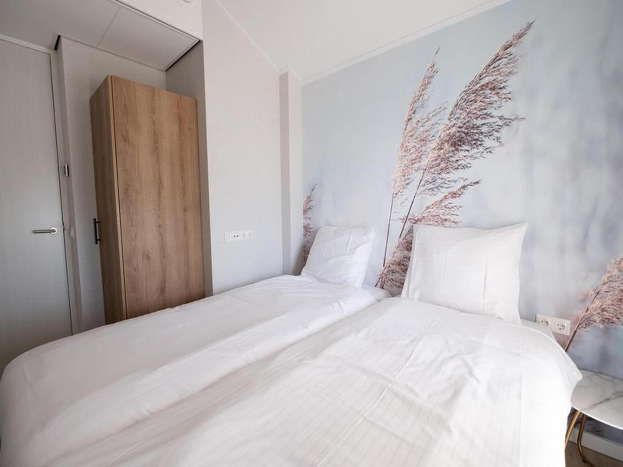 Een slaapkamer van Luxury Beach Apartment | 6 Pers. in Workum