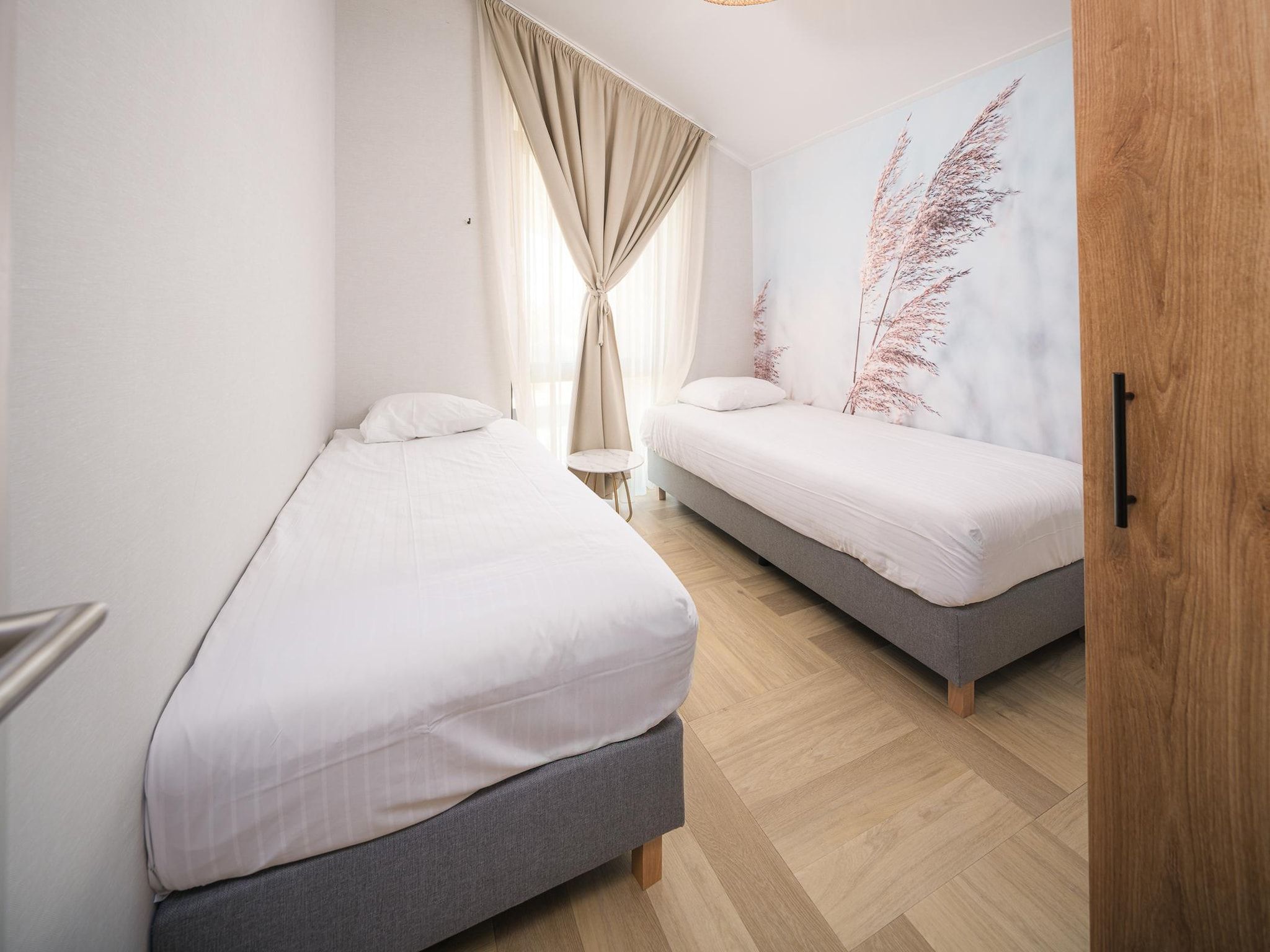 Een slaapkamer van Luxury Beach Apartment | 6 Pers. in Workum
