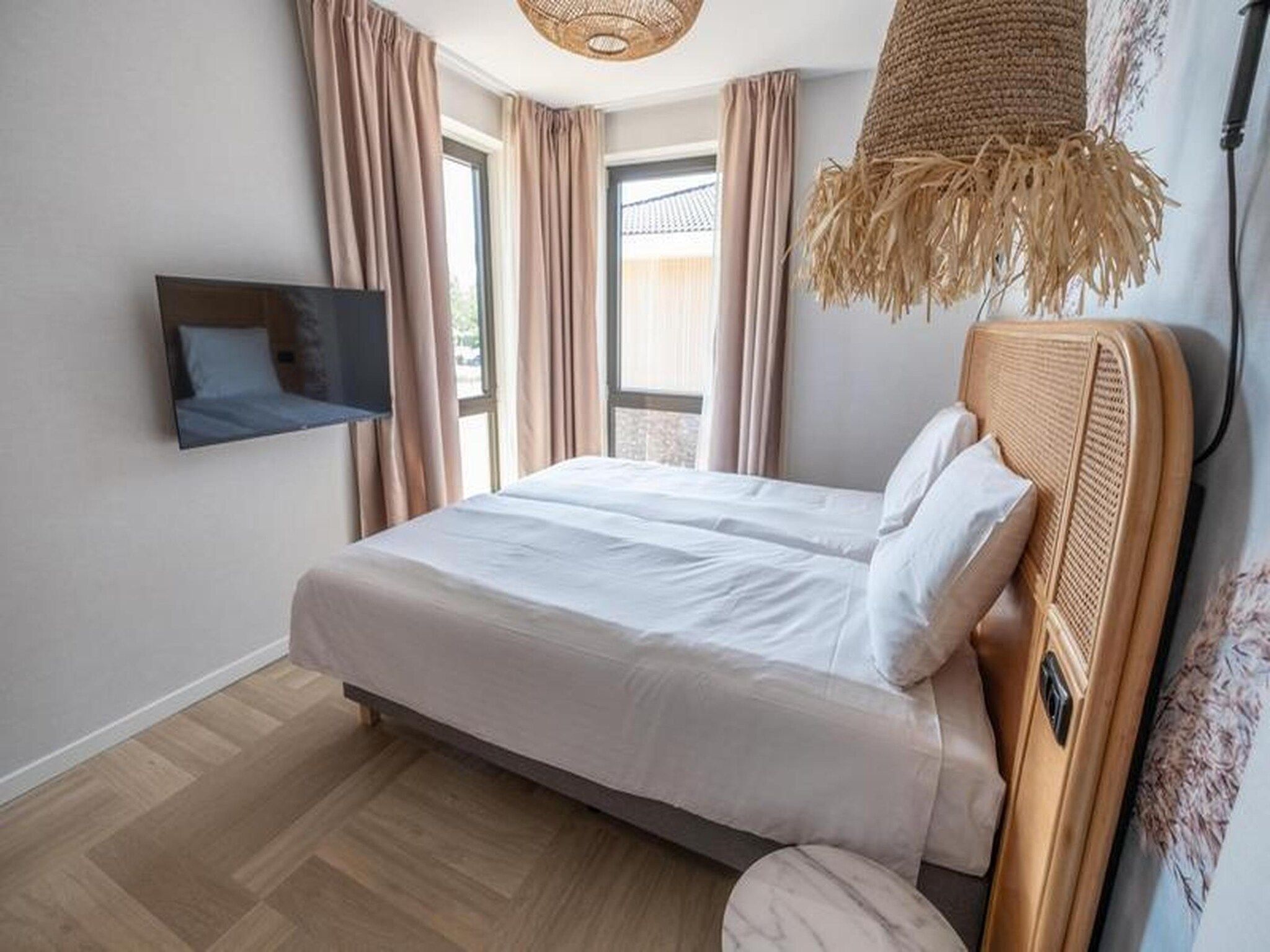 Een slaapkamer van Luxury Beach Apartment | 4 Pers. in Workum