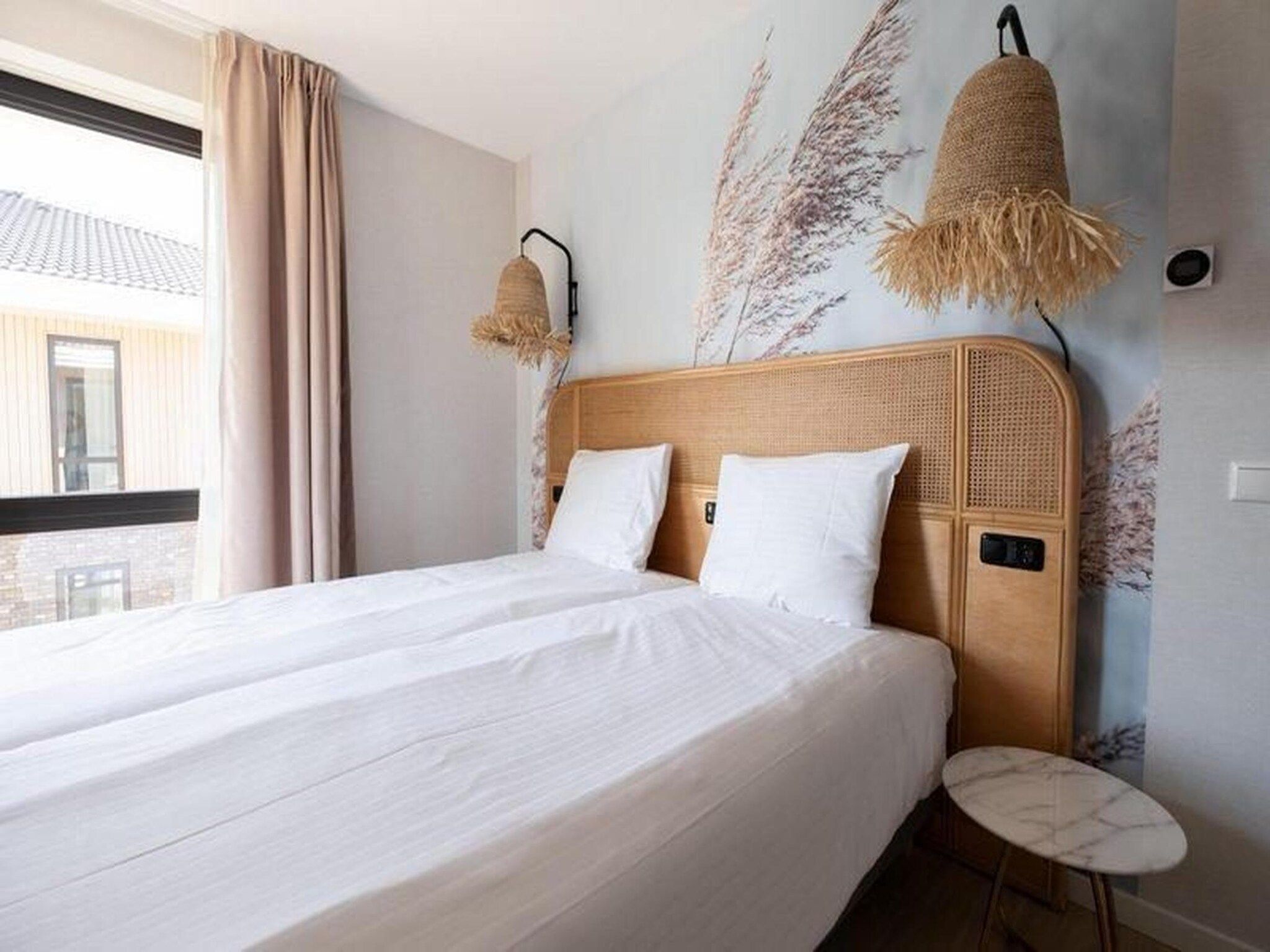 Een slaapkamer van Luxury Beach Apartment | 4+2 Pers. in Workum