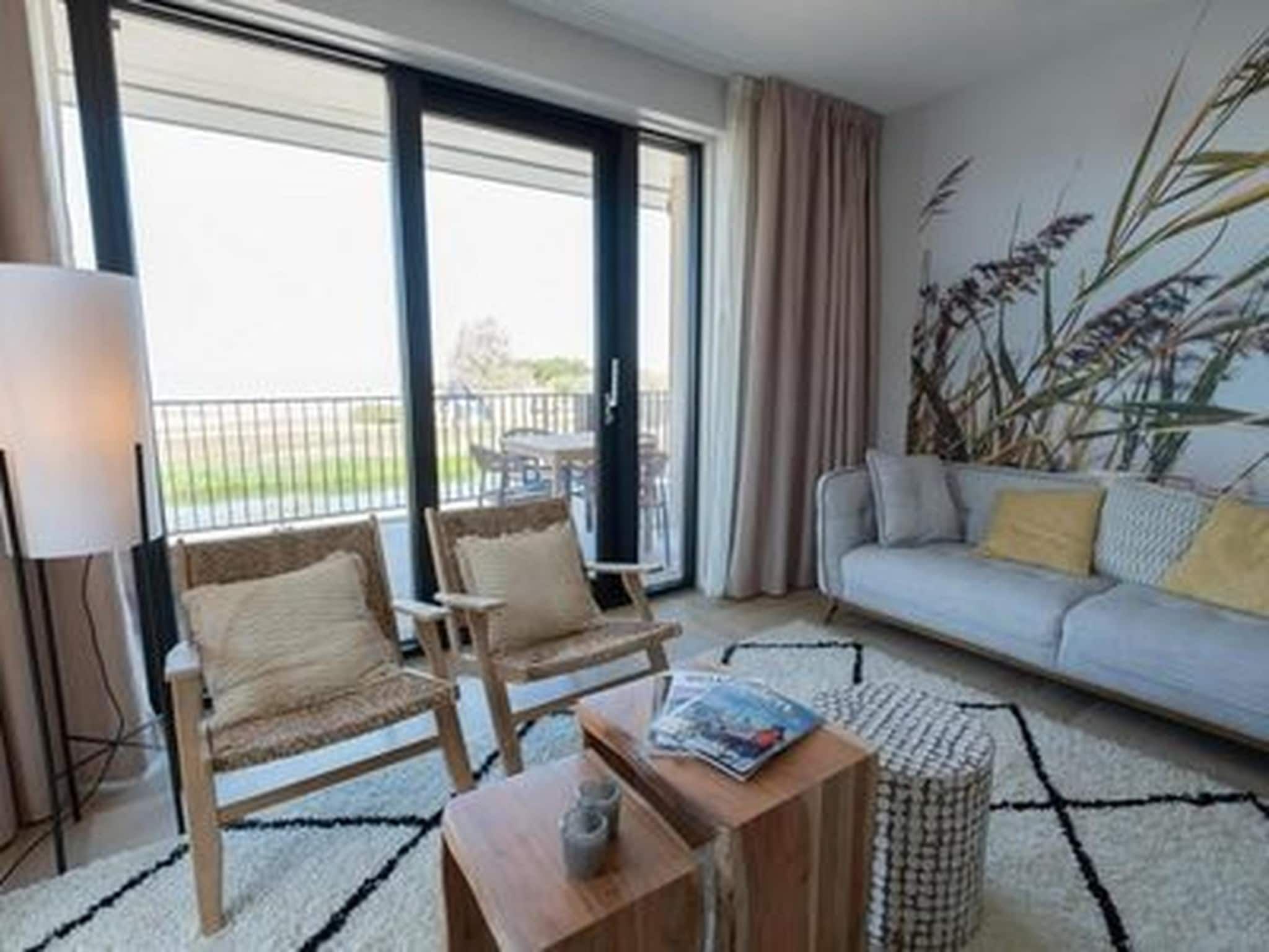 De woonkamer van Luxury Beach Apartment | 4+2 Pers. in Workum