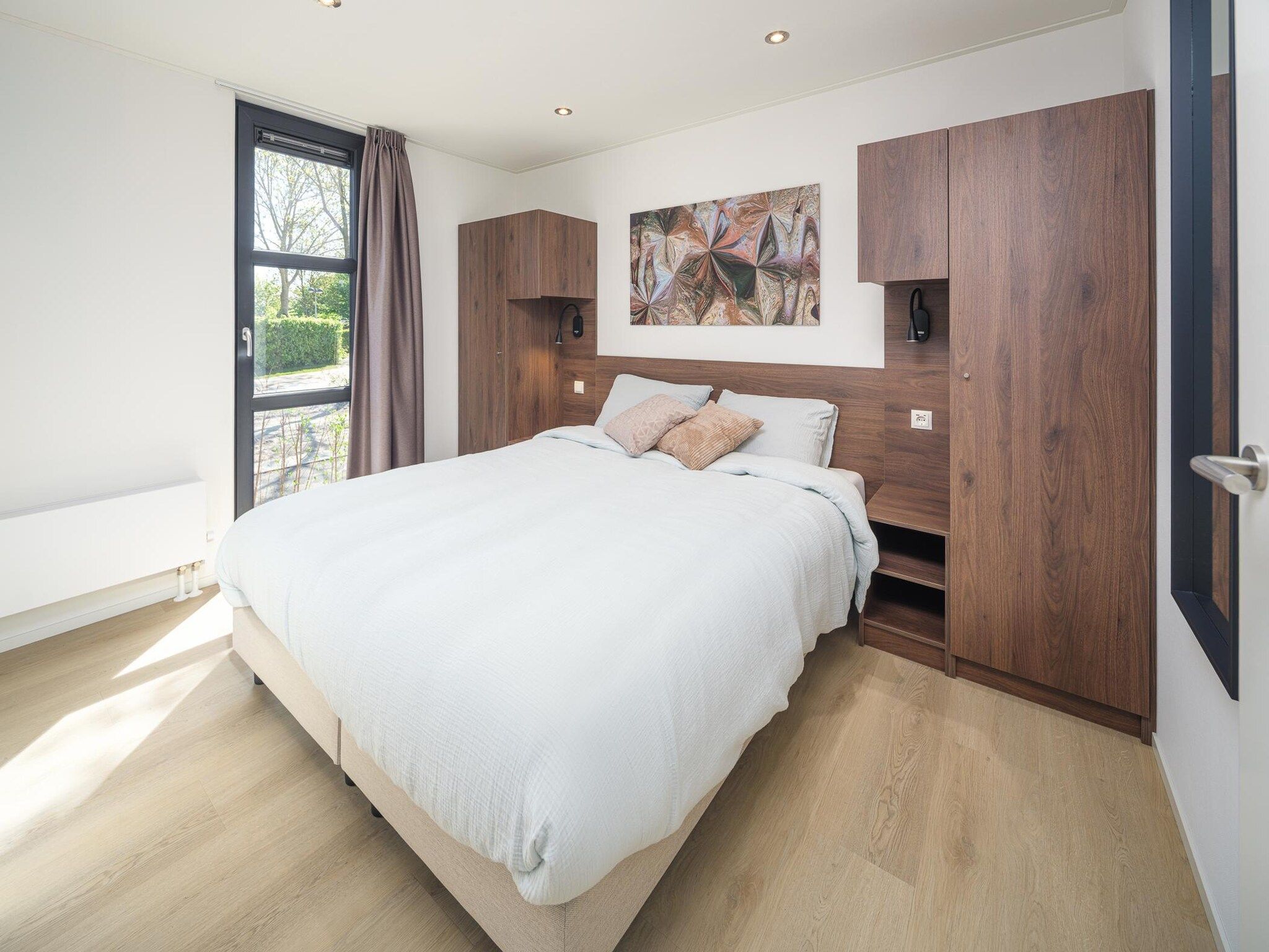 Een slaapkamer van Villa L-Meerzicht | 4 pers. Roof Terrace in Workum