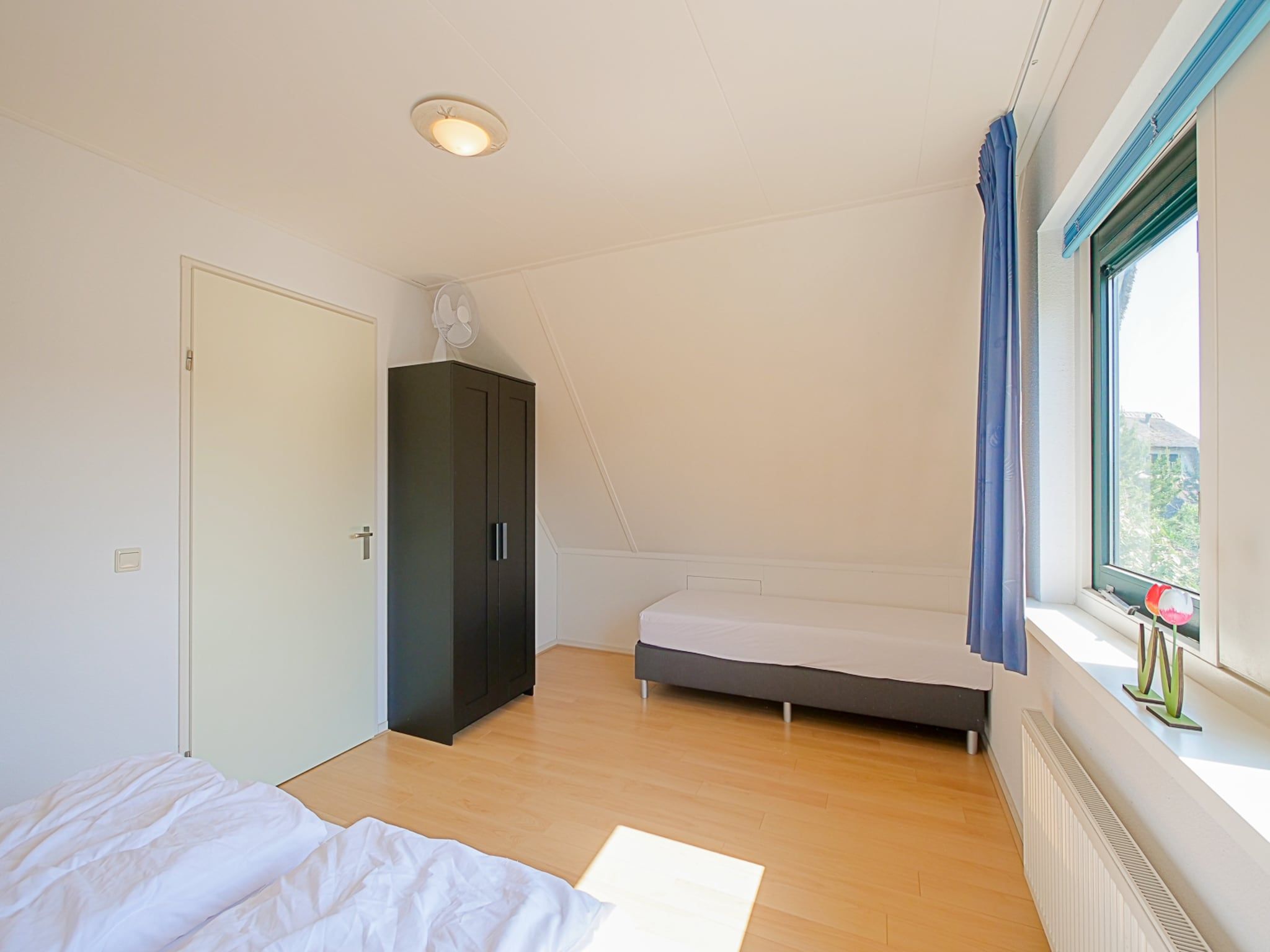 Een slaapkamer van Villa Noorderzon in Julianadorp