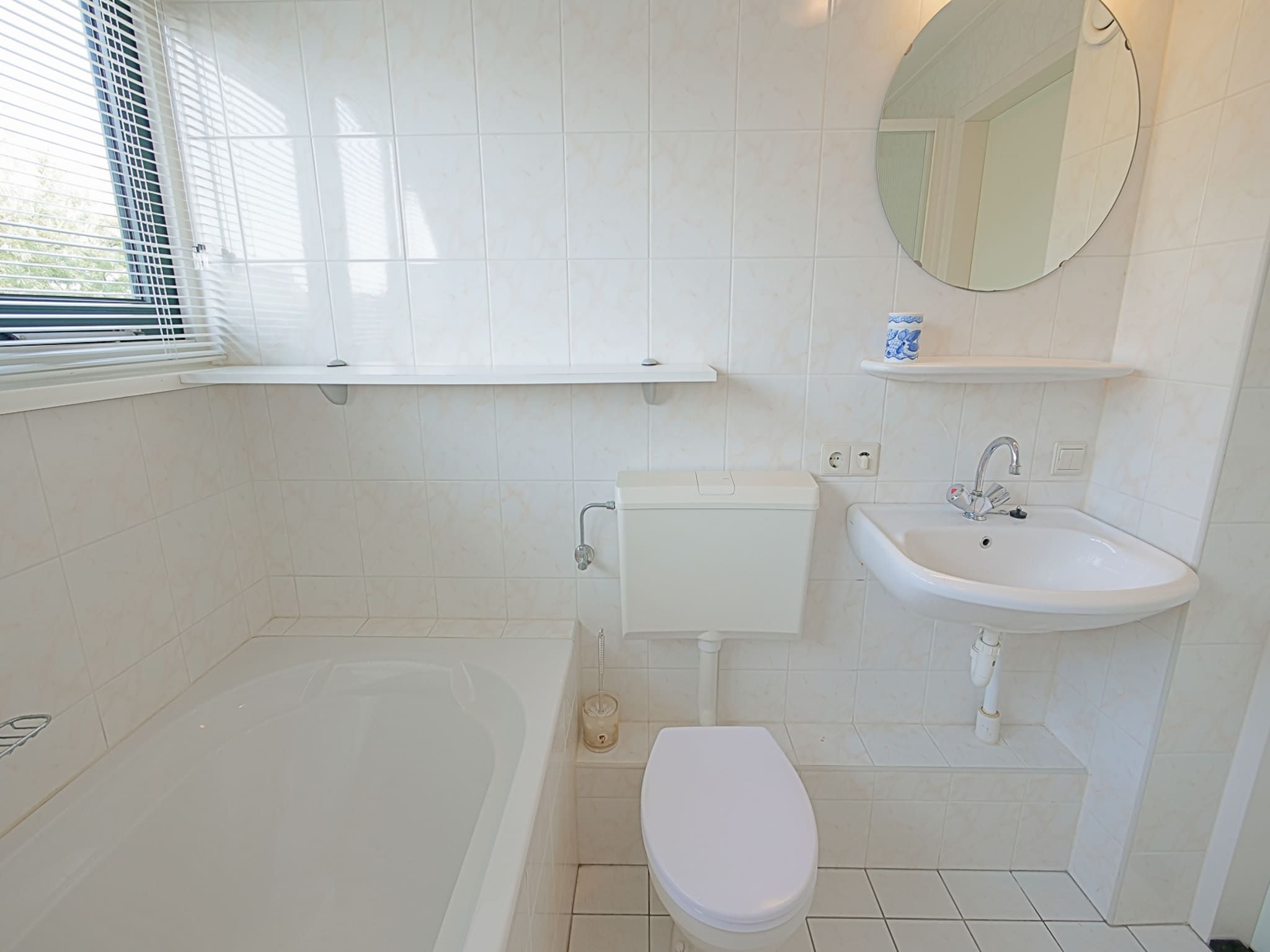 De badkamer van Villa Noorderzon in Julianadorp