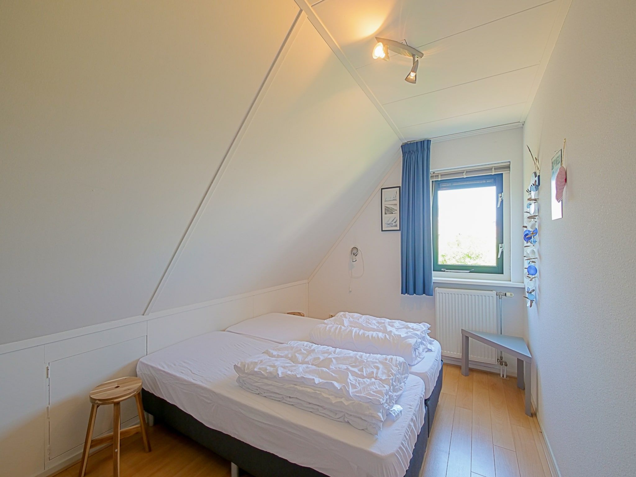 Een slaapkamer van Villa Noorderzon in Julianadorp