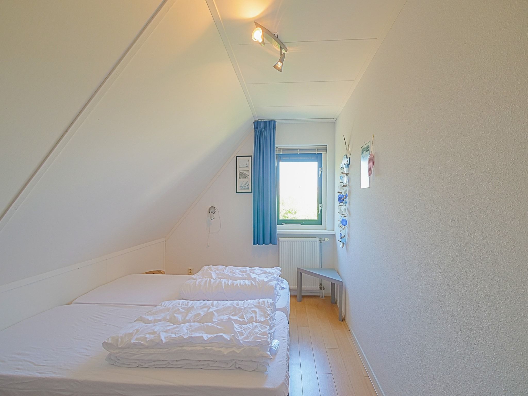 Een slaapkamer van Villa Noorderzon in Julianadorp