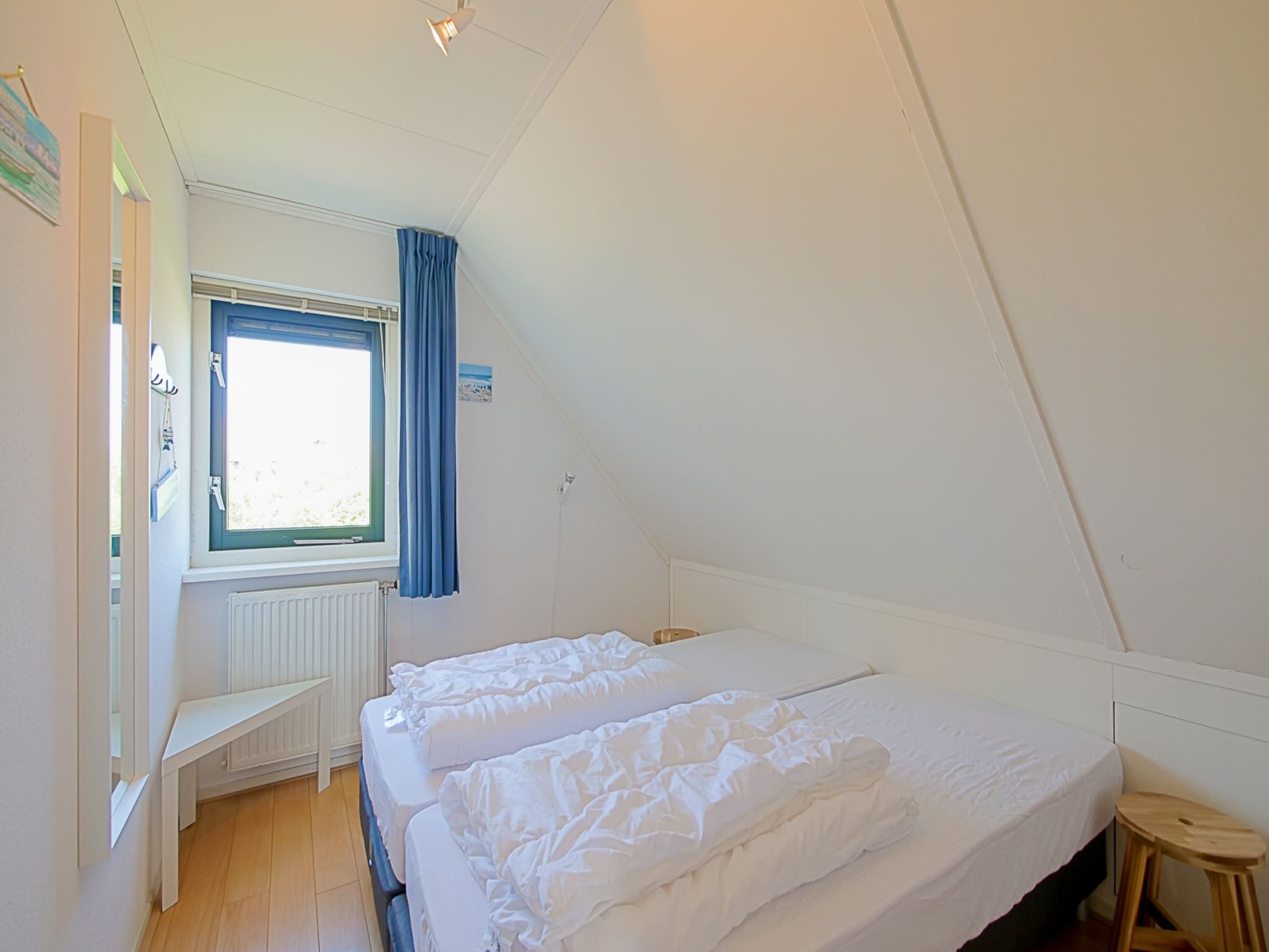 Een slaapkamer van Villa Noorderzon in Julianadorp