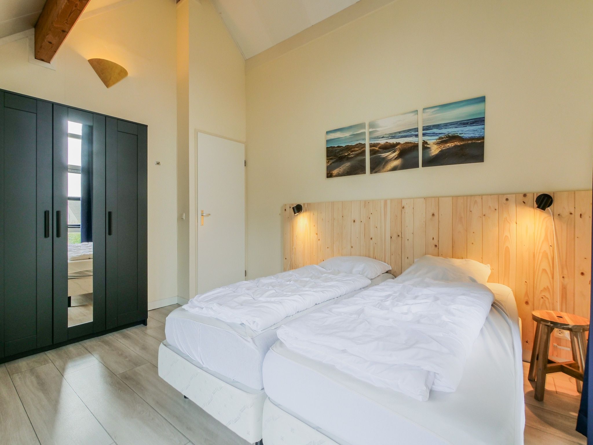 Een slaapkamer van Ooghduyne Villa Opduin in Julianadorp