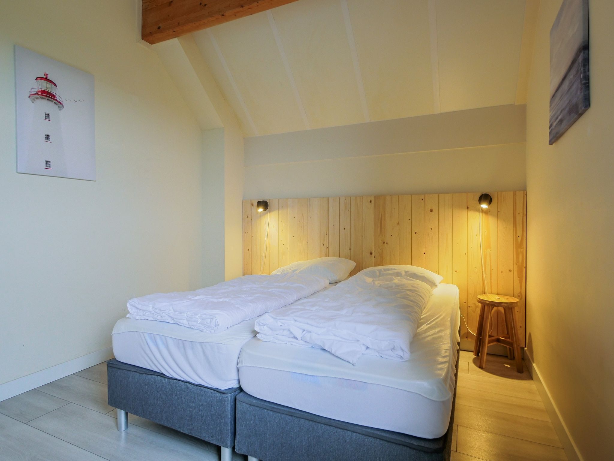 Een slaapkamer van Ooghduyne Villa Opduin in Julianadorp