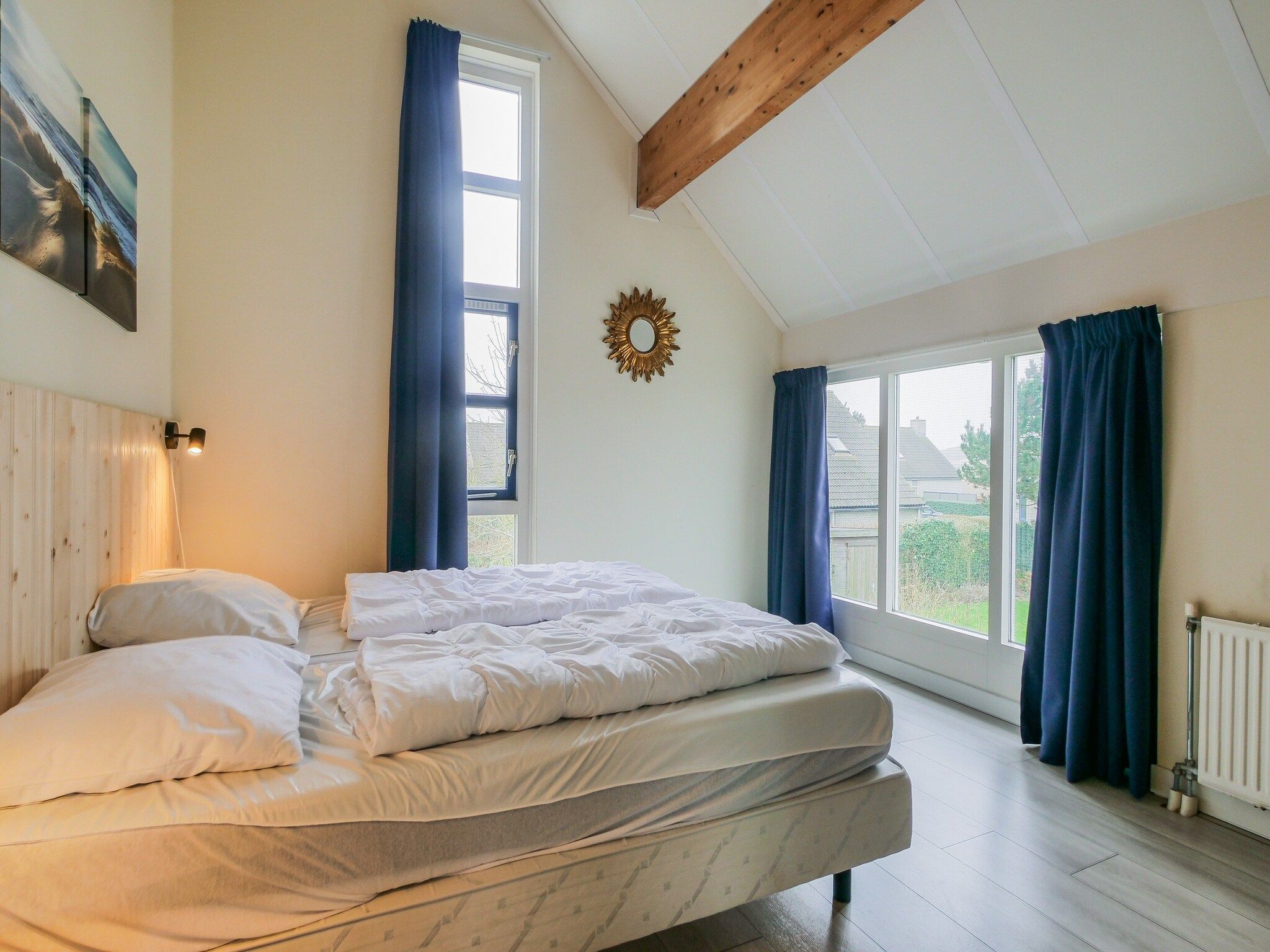 Een slaapkamer van Ooghduyne Villa Opduin in Julianadorp