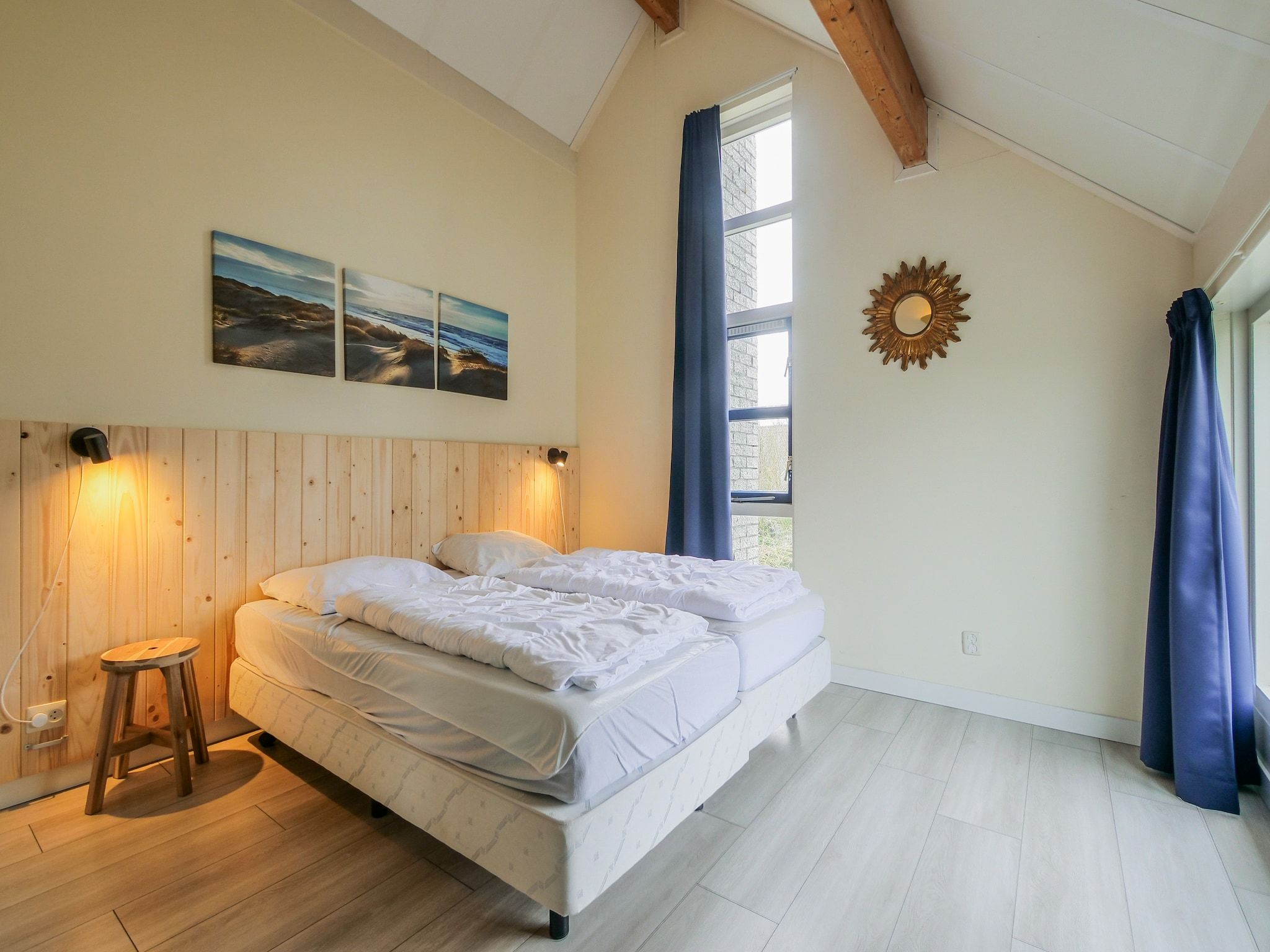 Een slaapkamer van Ooghduyne Villa Opduin in Julianadorp