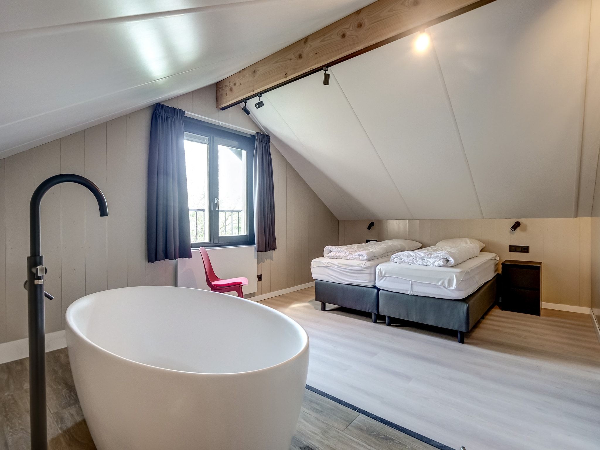 Een slaapkamer van Huis Zee in Julianadorp