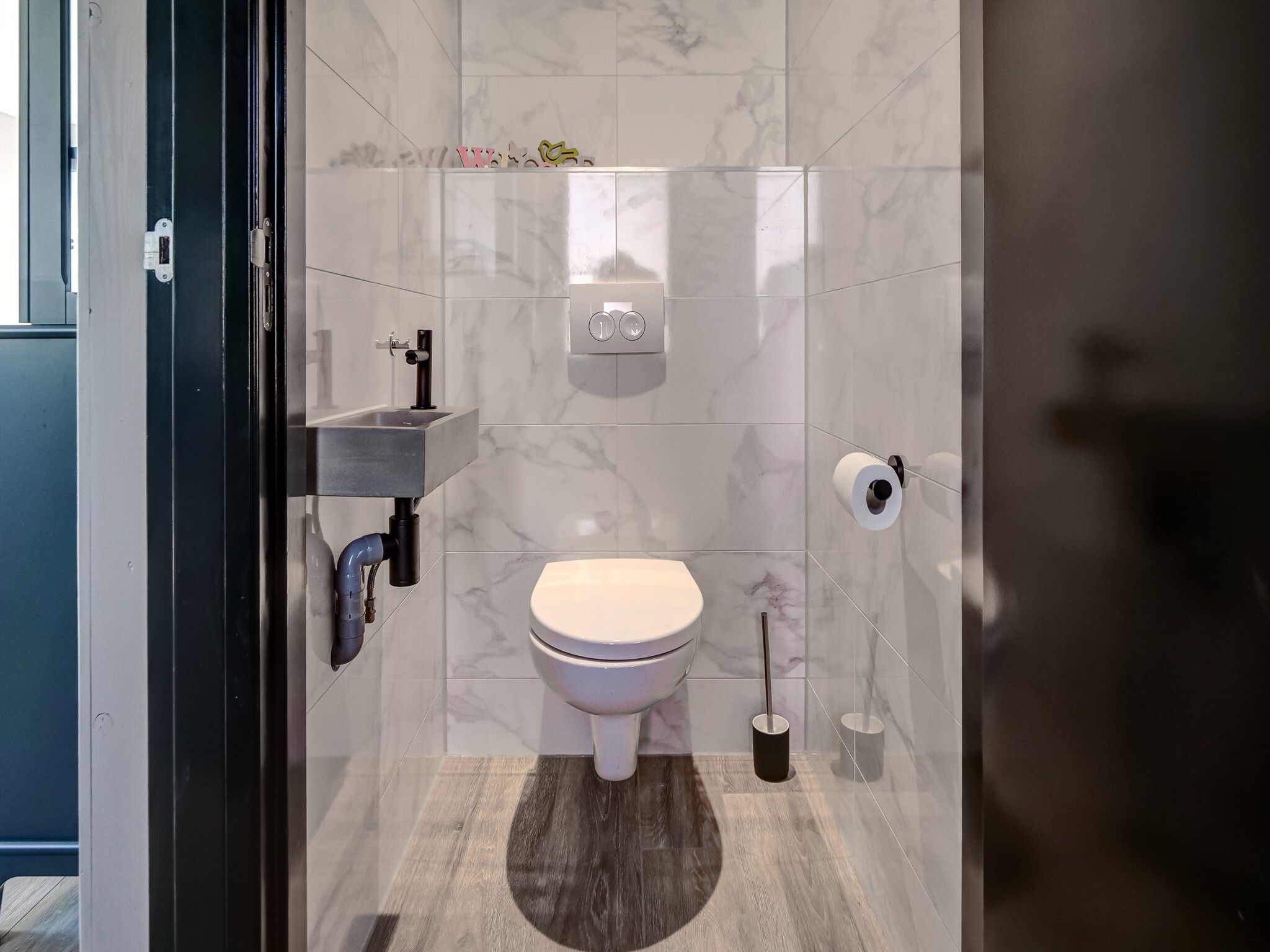 De badkamer van Huis Zee in Julianadorp