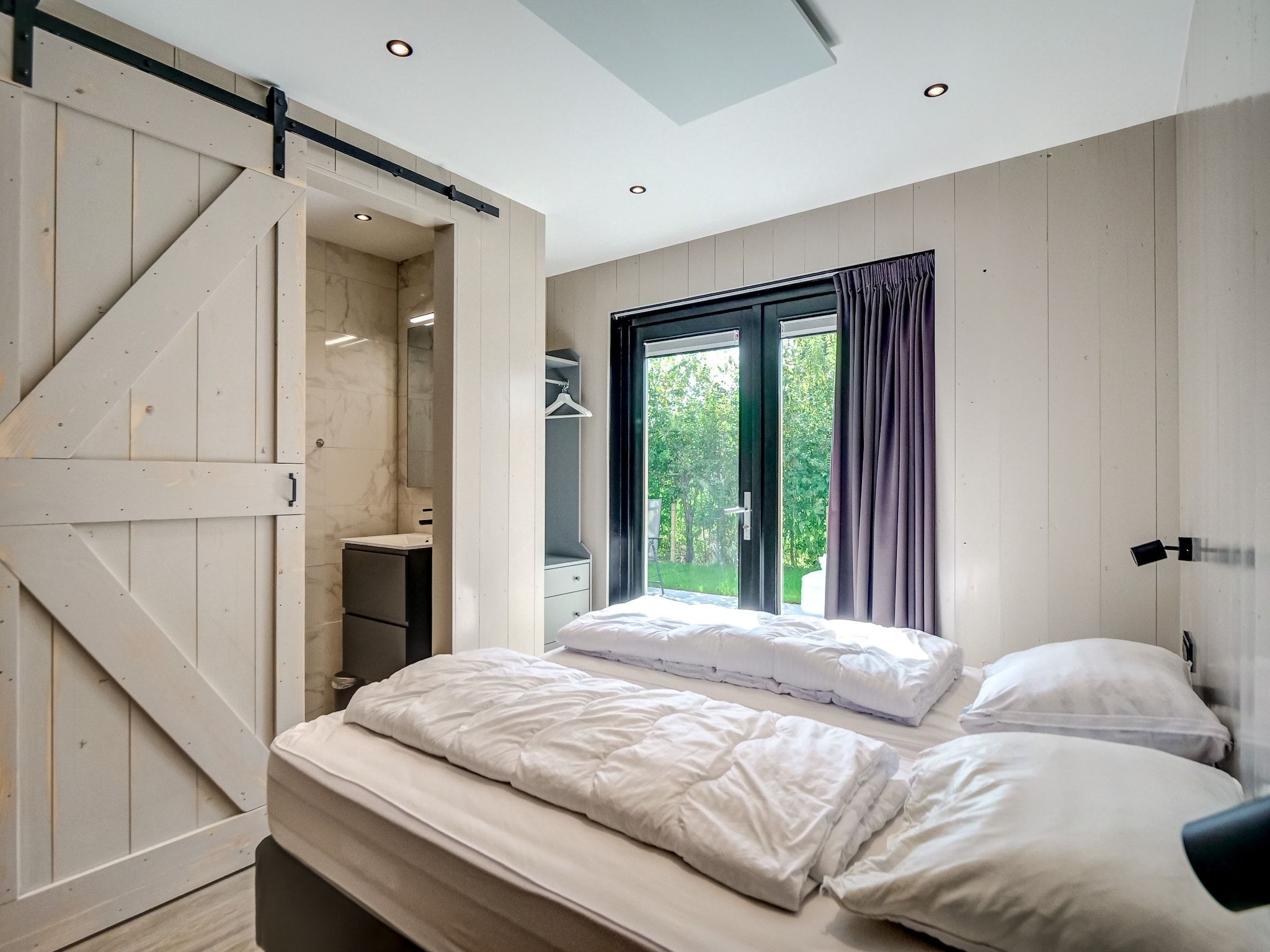 Een slaapkamer van Huis Zee in Julianadorp