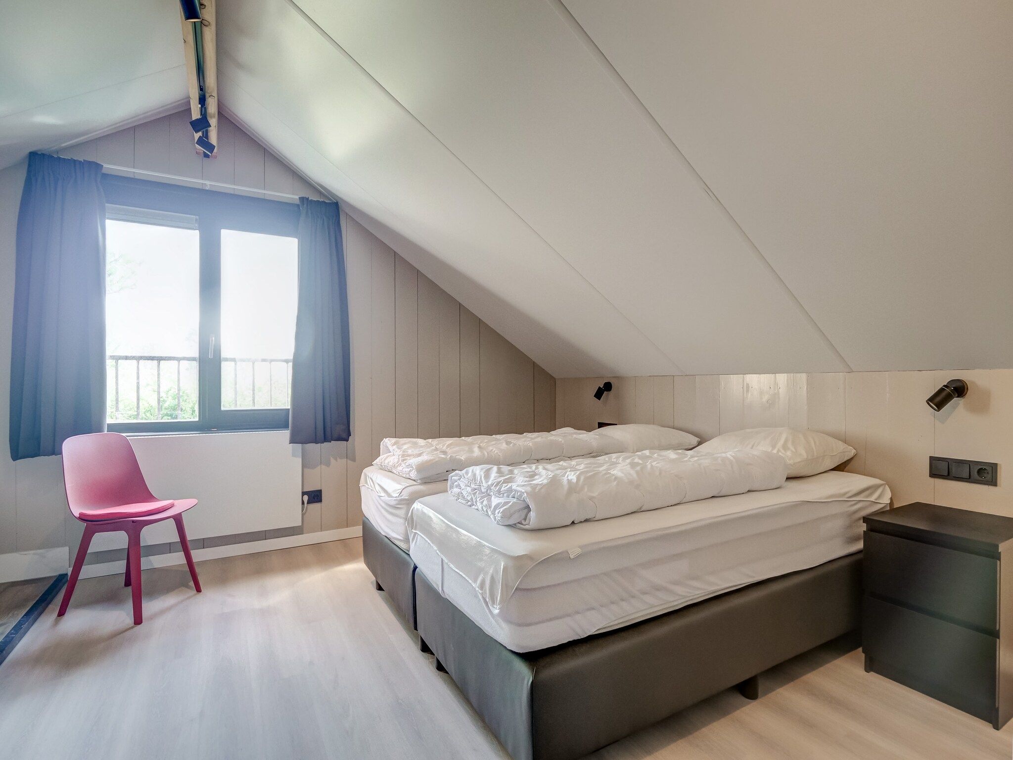 Een slaapkamer van Huis Zee in Julianadorp