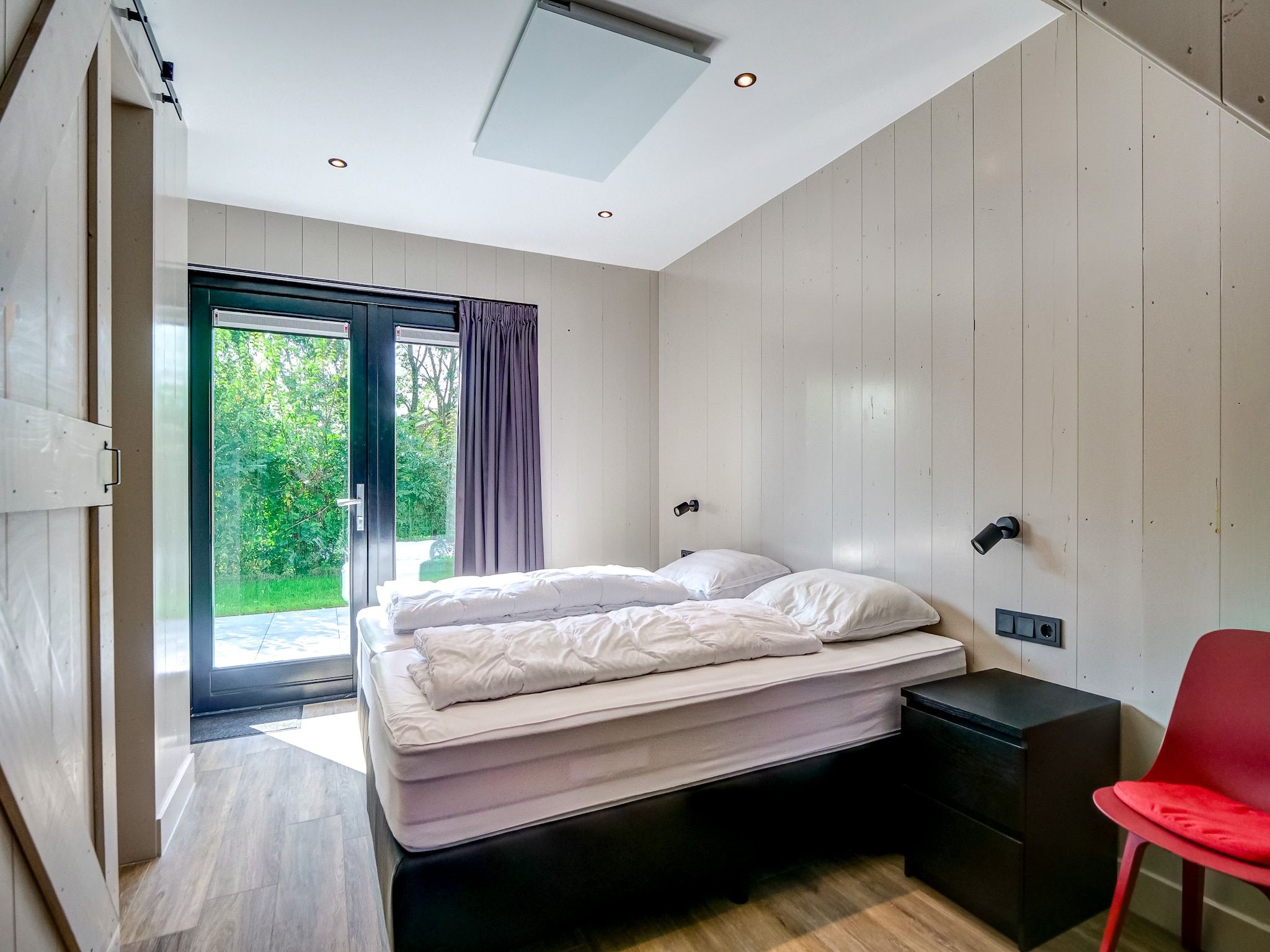 Een slaapkamer van Huis Zee in Julianadorp