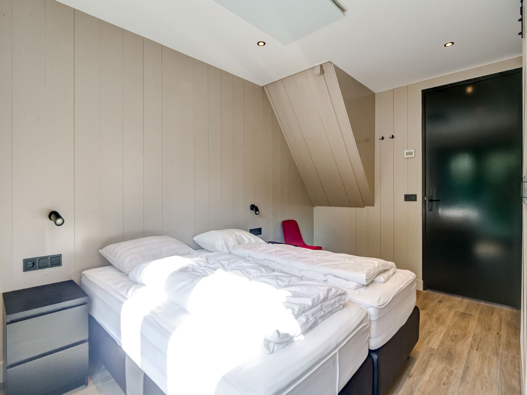 Een slaapkamer van Huis Zee in Julianadorp