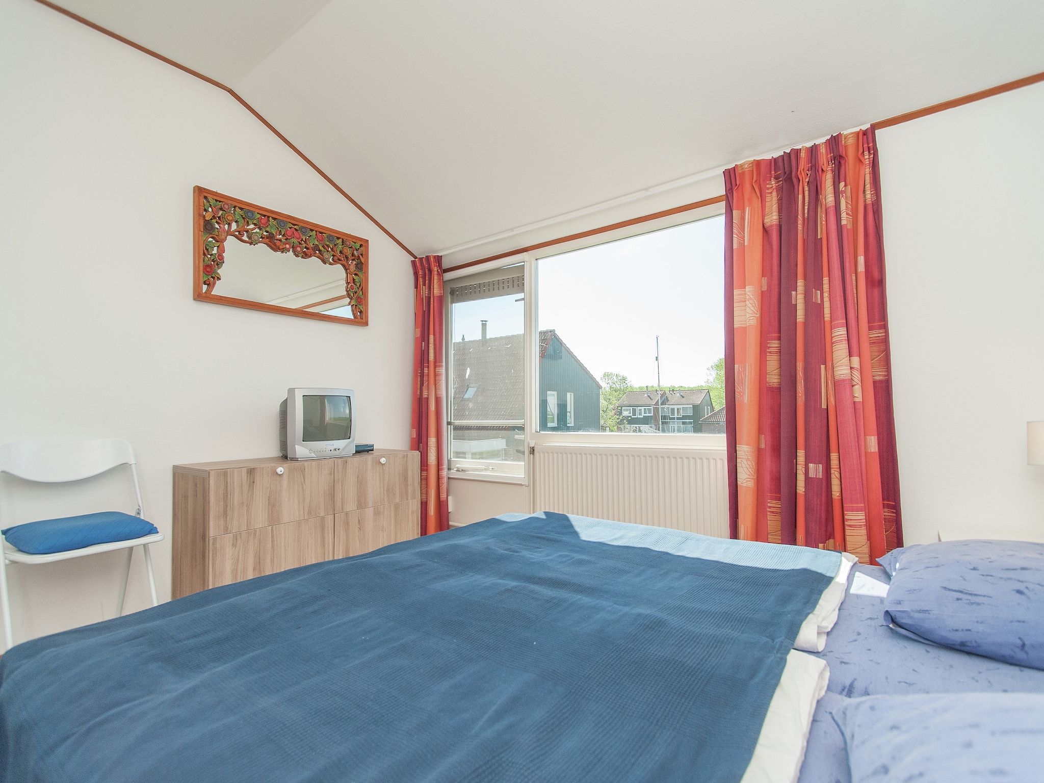 Een slaapkamer van De Waske in Warns