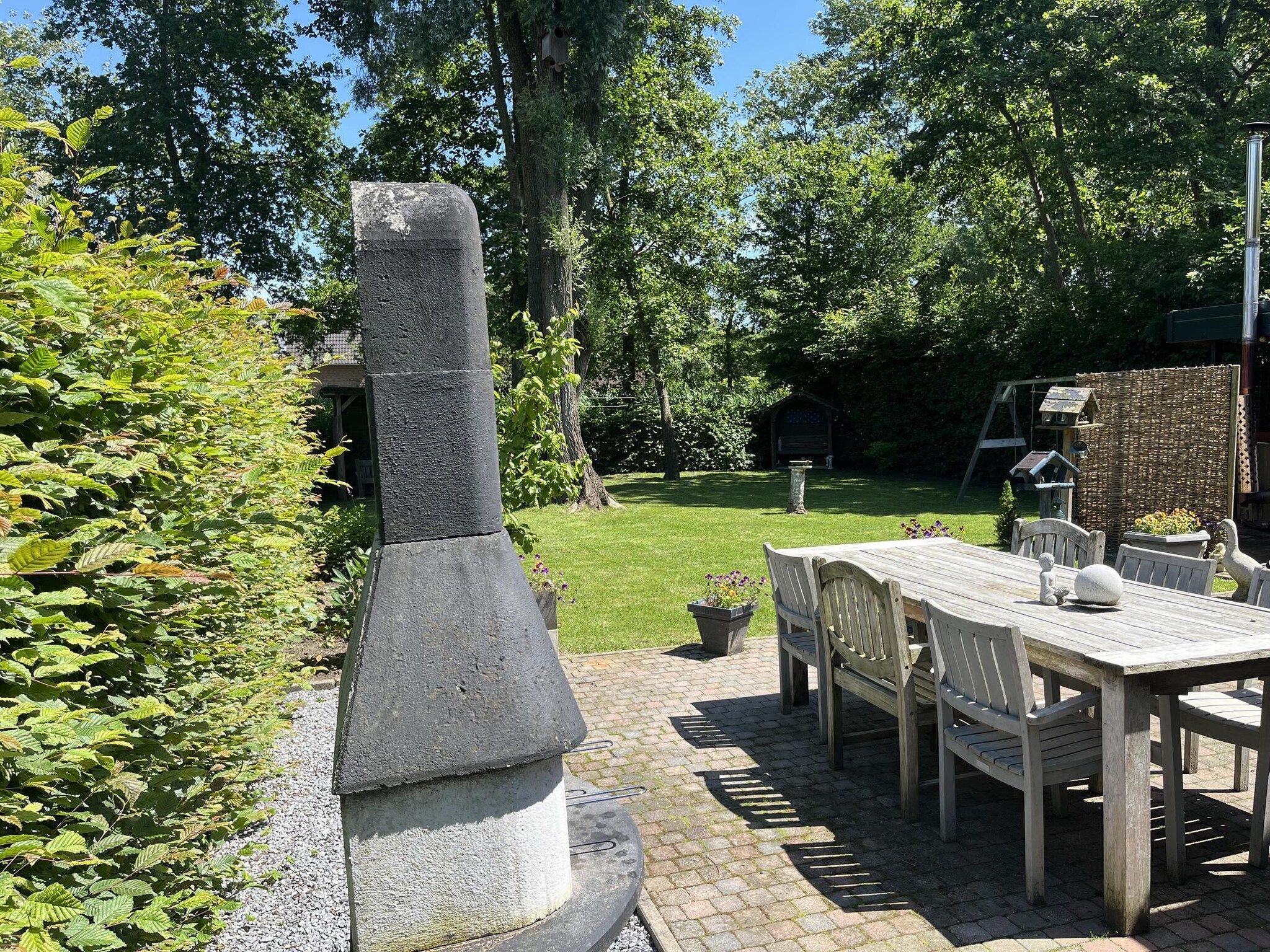 Het terras van 6 - Persons De Zingende Wilg in Ewijk