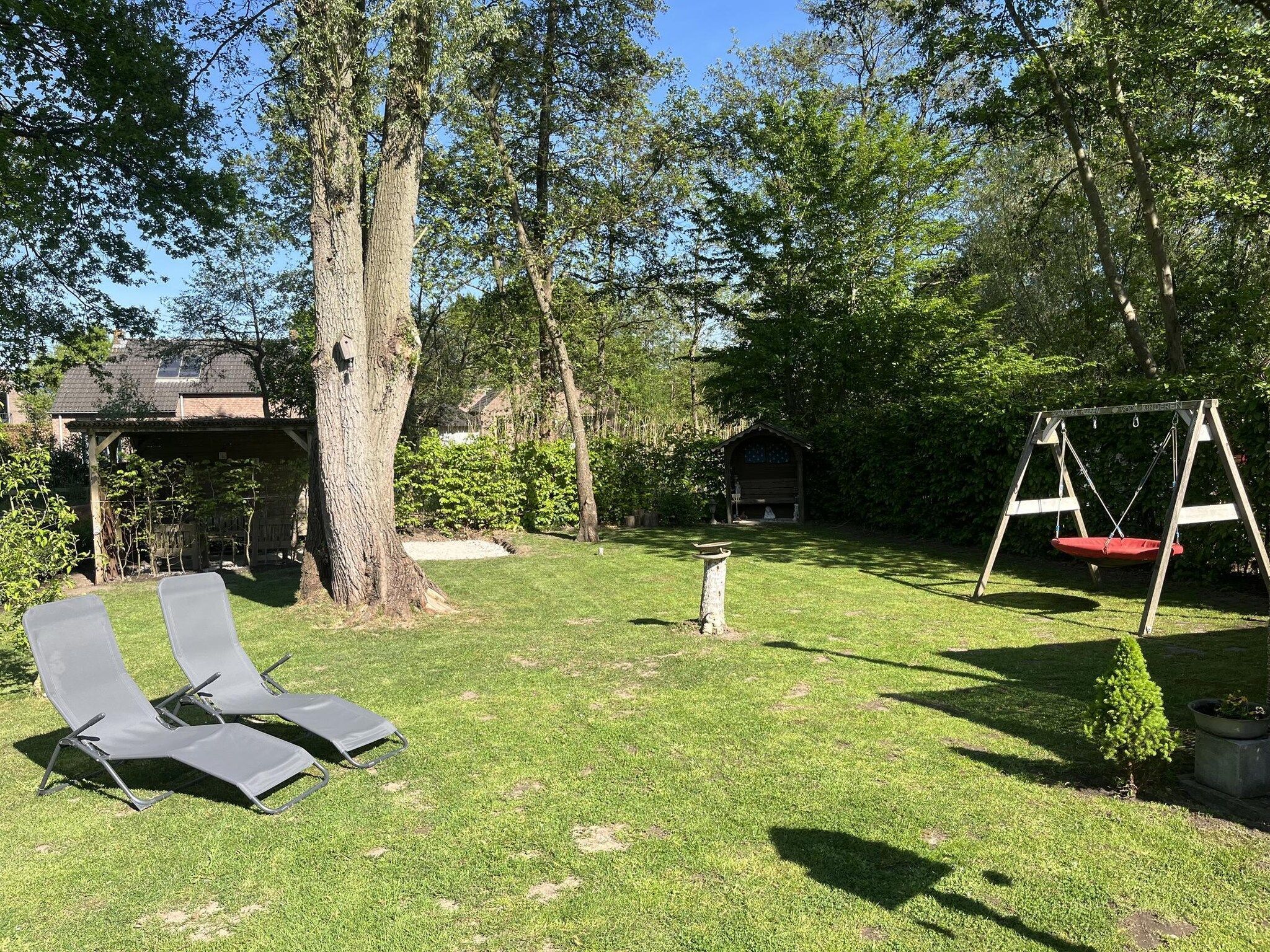 De tuin van 6 - Persons De Zingende Wilg in Ewijk