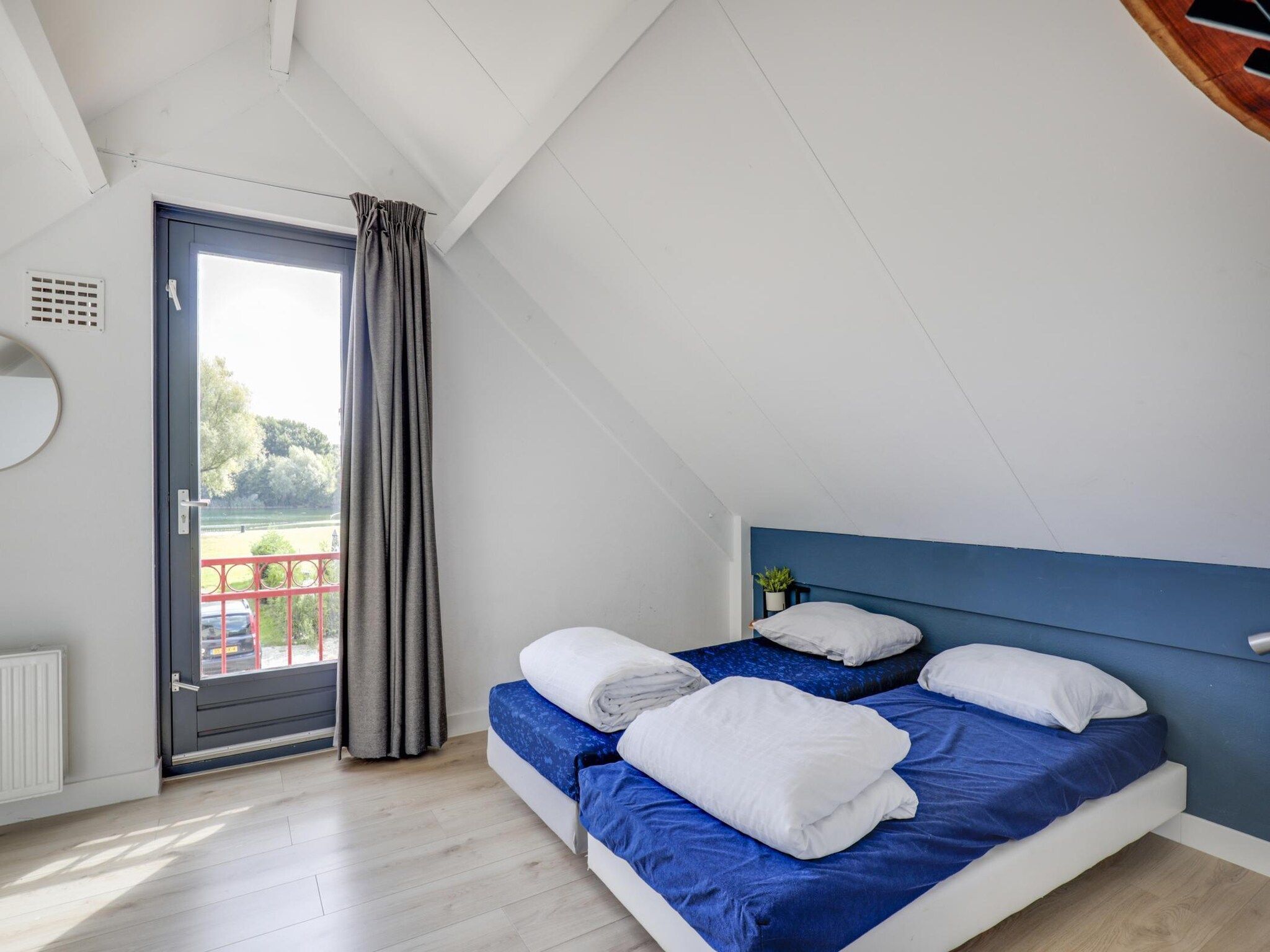 Een slaapkamer van 6 - Persons De Zingende Wilg (copy) (copy) in Ewijk
