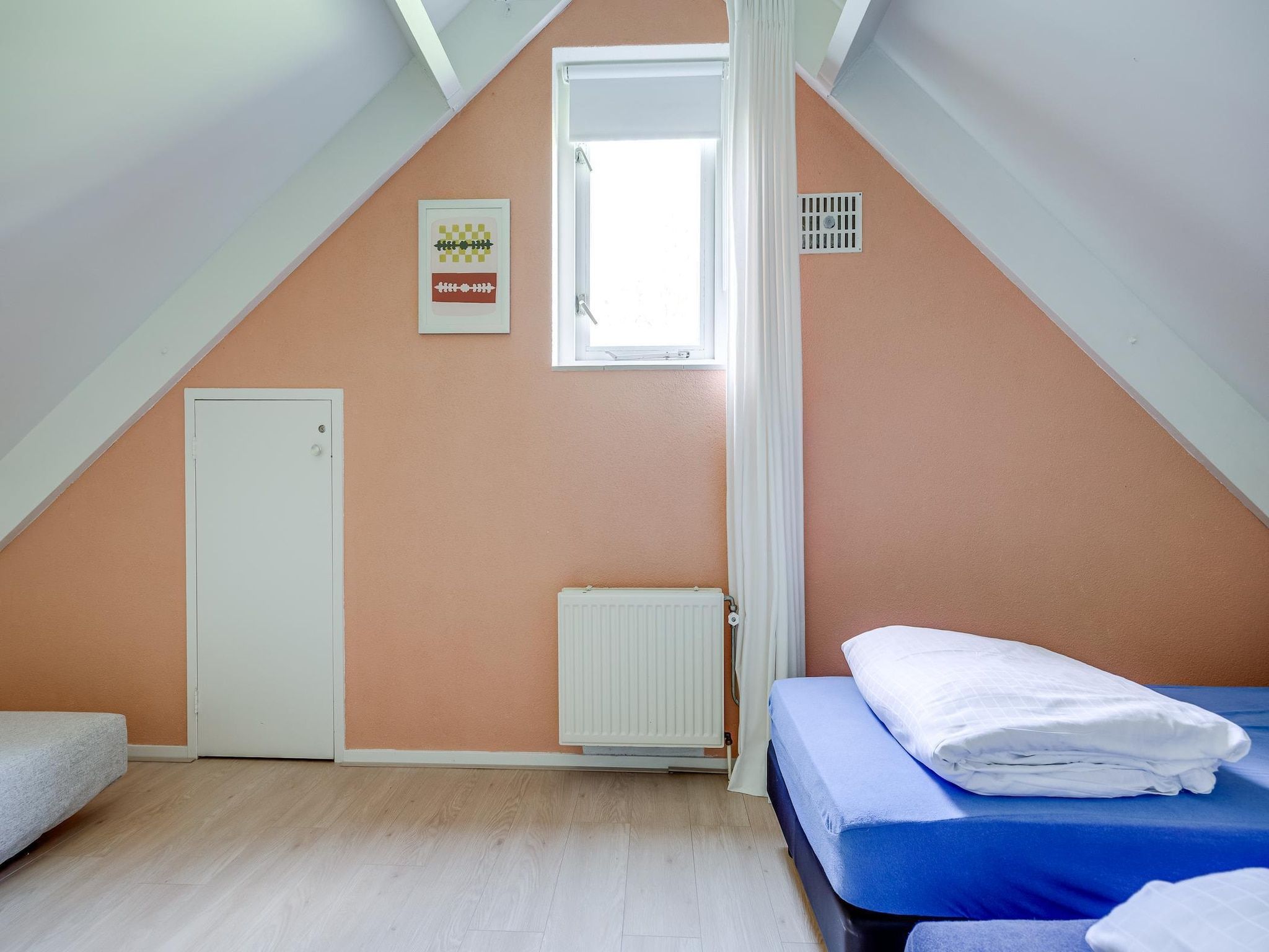 Een slaapkamer van 7 - Persoons Forest 217 Sauna Bungalow (copy) in Ewijk