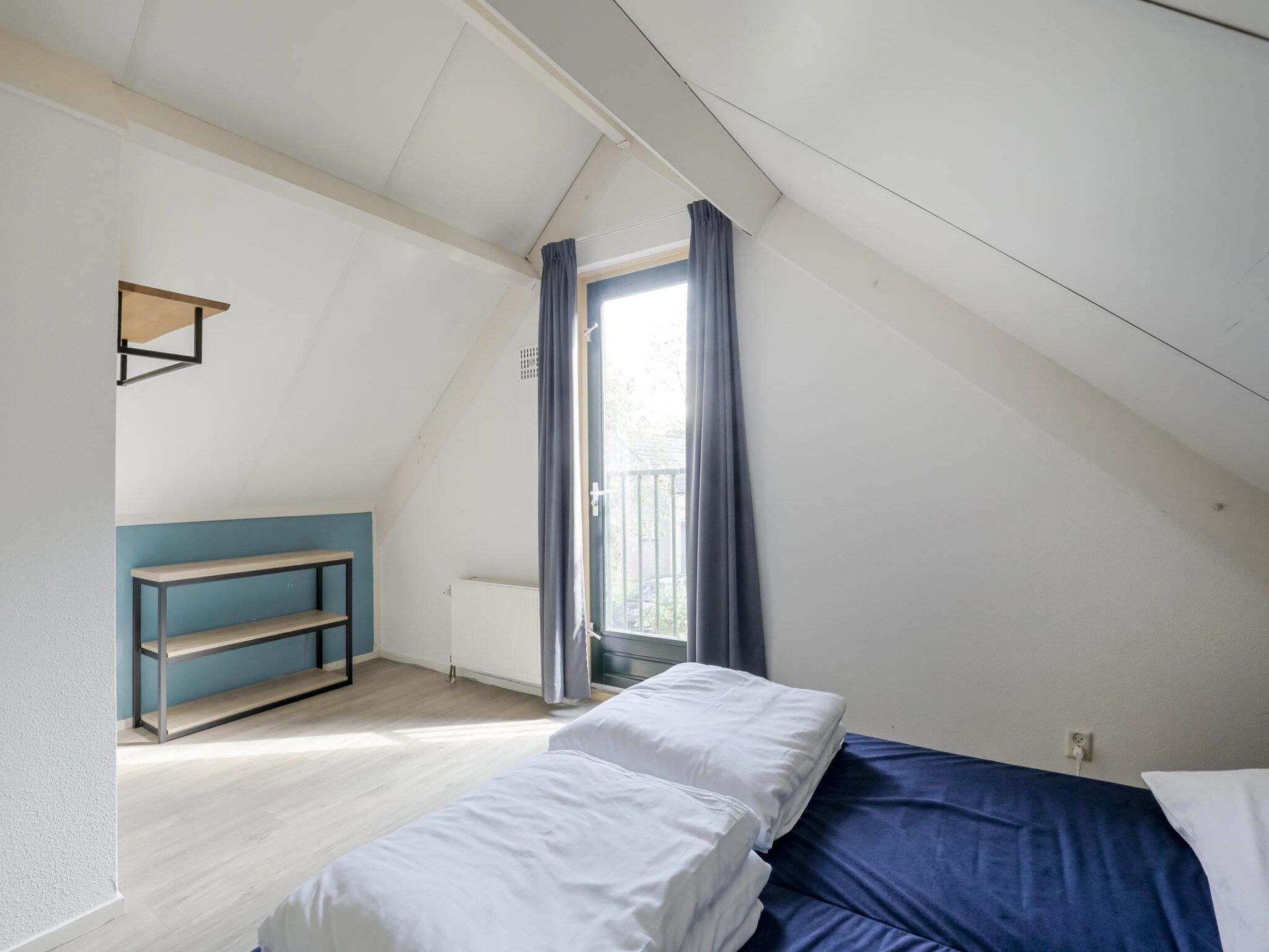 Een slaapkamer van 7 - Persoons Forest 217 Sauna Bungalow (copy) (copy) in Ewijk