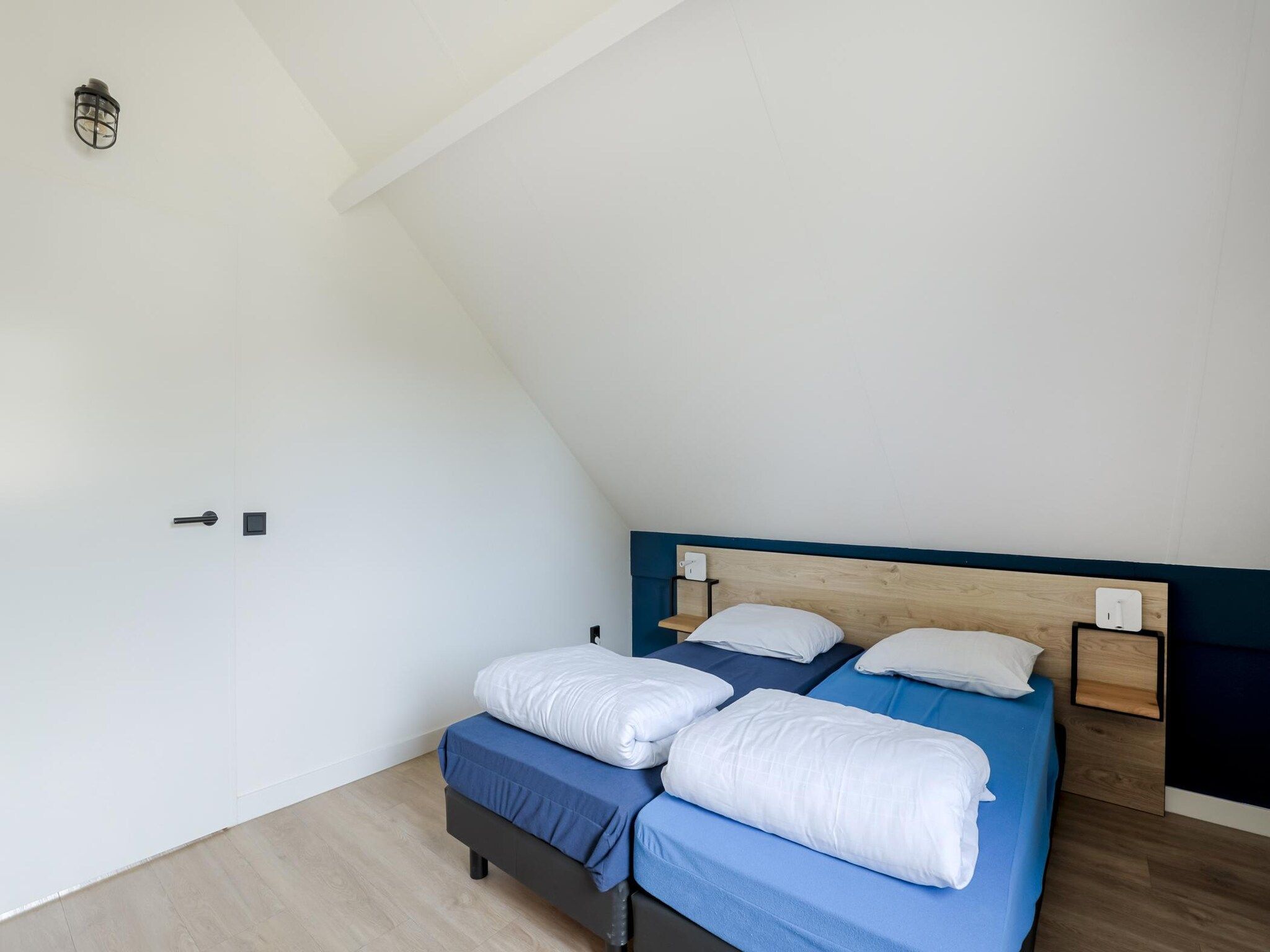 Een slaapkamer van 6 - Persons De Zingende Wilg (copy) in Ewijk
