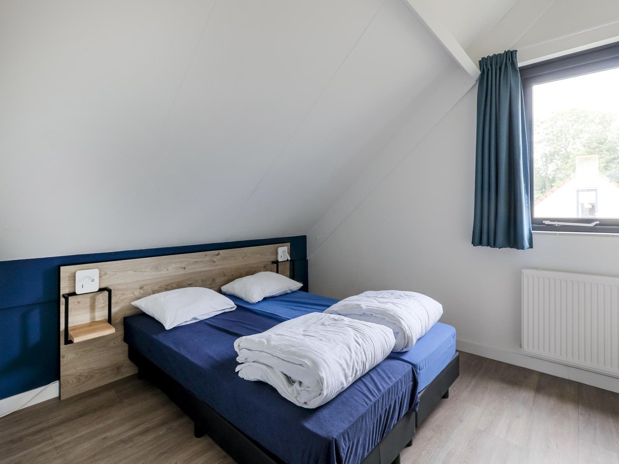 Een slaapkamer van 6 - Persons De Zingende Wilg (copy) in Ewijk