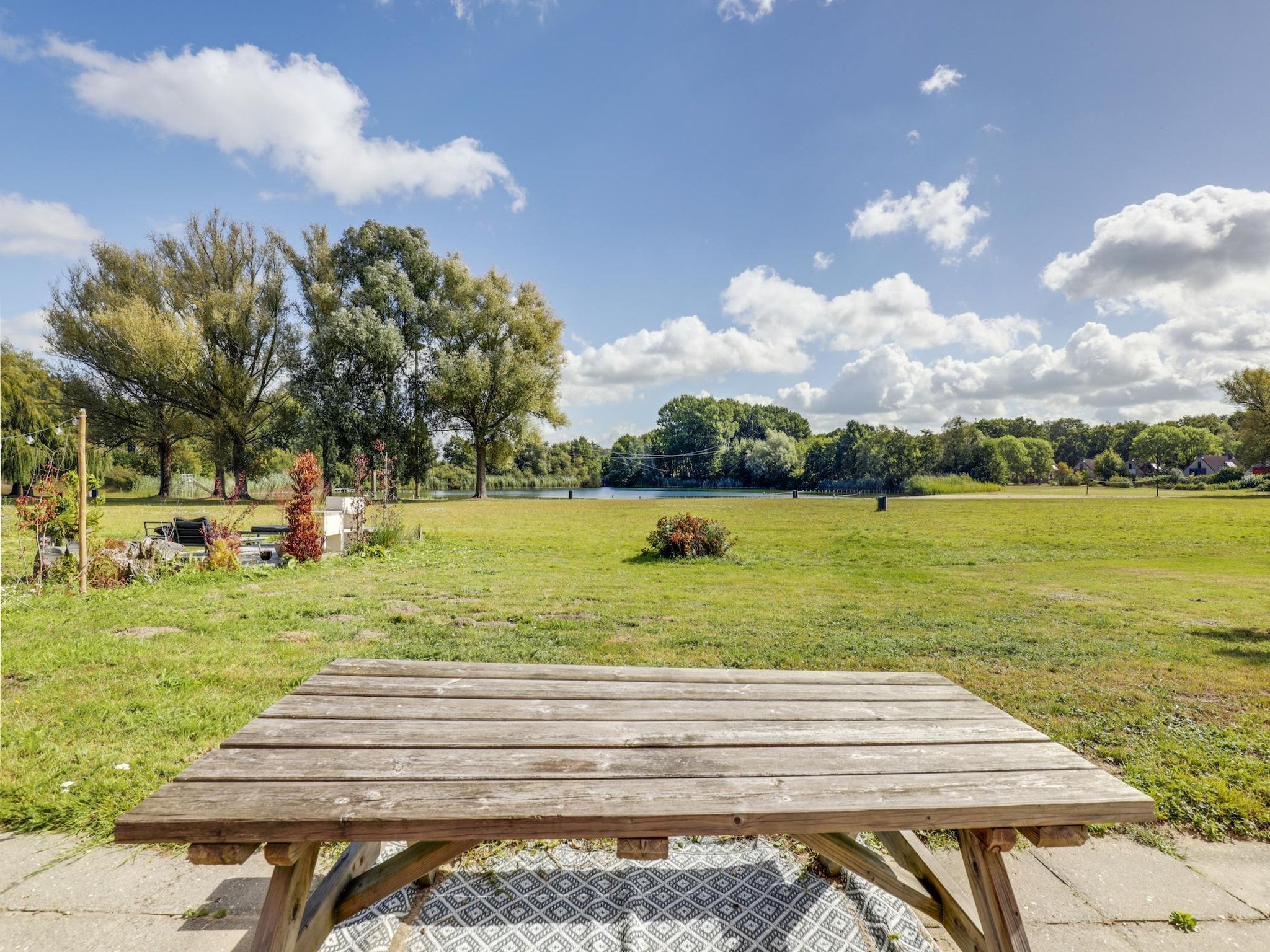 Het terras van 6 - Persons De Zingende Wilg (copy) (copy) in Ewijk