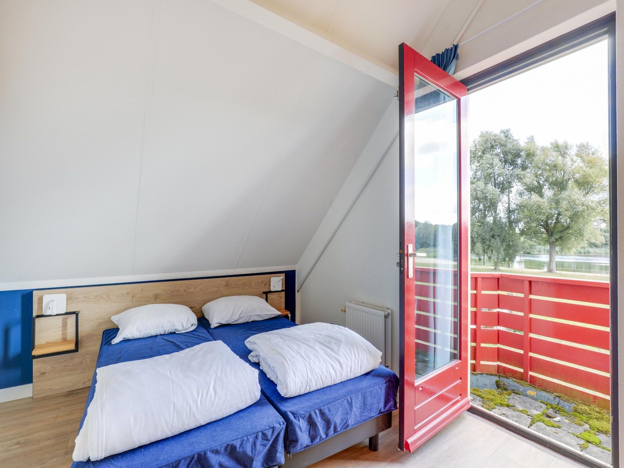 Een slaapkamer van 6 - Persons De Zingende Wilg (copy) (copy) in Ewijk