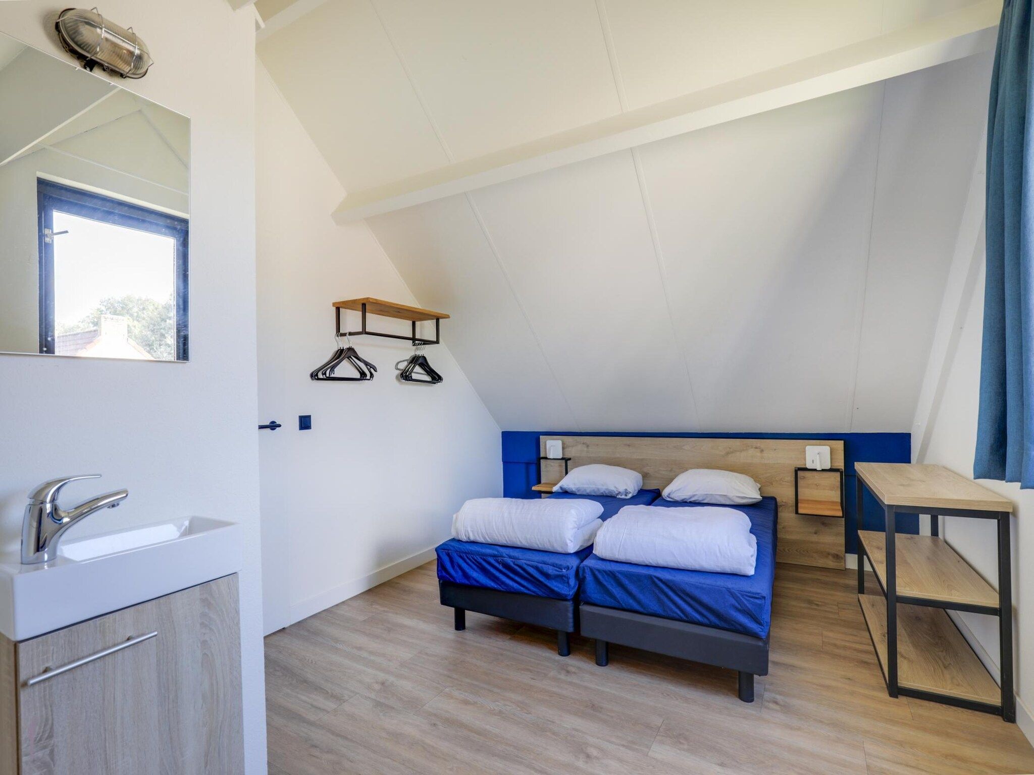 Een slaapkamer van 6 - Persons De Zingende Wilg (copy) (copy) in Ewijk